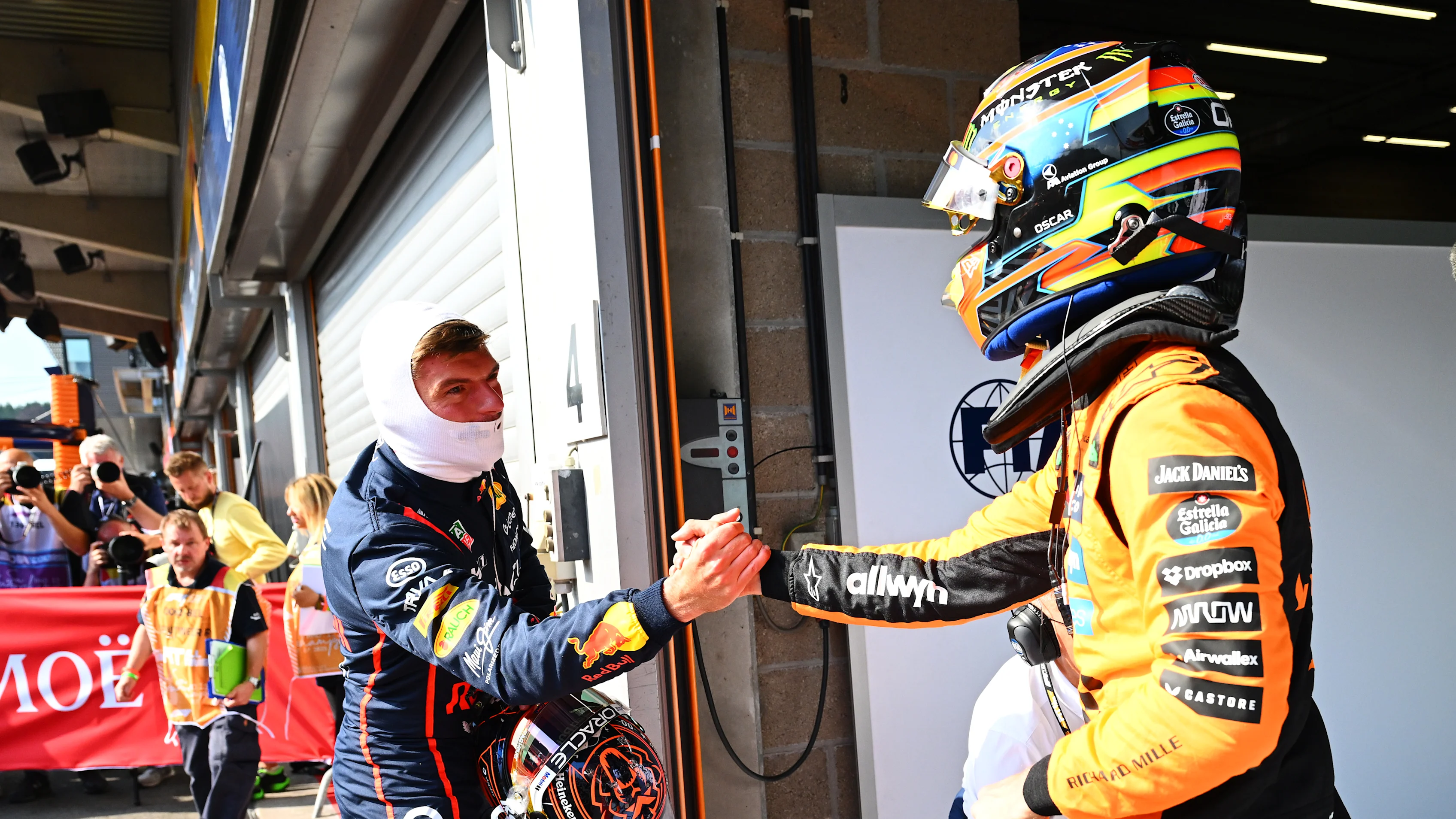 SPA, BELGIUM - JULY 25: Sprint 2nd qualifier Max Verstappen of the Netherlands and Oracle Red Bull Racing and Sprint Pole qualifier Oscar Piastri of Australia and McLaren congratulate each other in parc ferme during Sprint qualifying ahead of the F1 Grand Prix of Belgium at Circuit de Spa-Francorchamps on July 25, 2025 in Spa, Belgium. (Photo by Mark Sutton - Formula 1/Formula 1 via Getty Images)