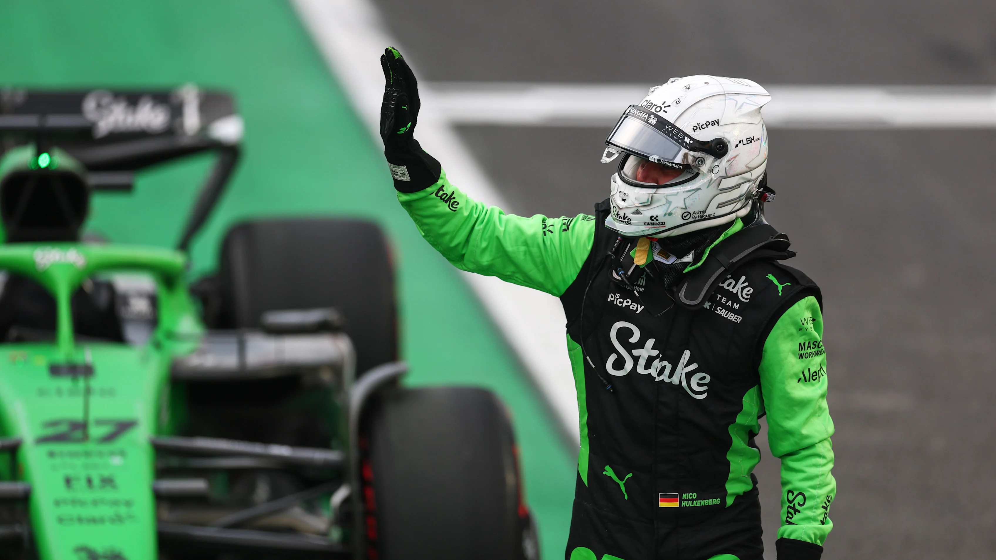 SAO PAULO, BRAZIL - NOVEMBER 07: Nico Hulkenberg of Germany and Stake F1 Team Kick Sauber waves in parc ferme during Sprint Qualifying ahead of the F1 Grand Prix of Brazil at Autodromo Jose Carlos Pace on November 07, 2025 in Sao Paulo, Brazil. (Photo by Mark Thompson/Getty Images)