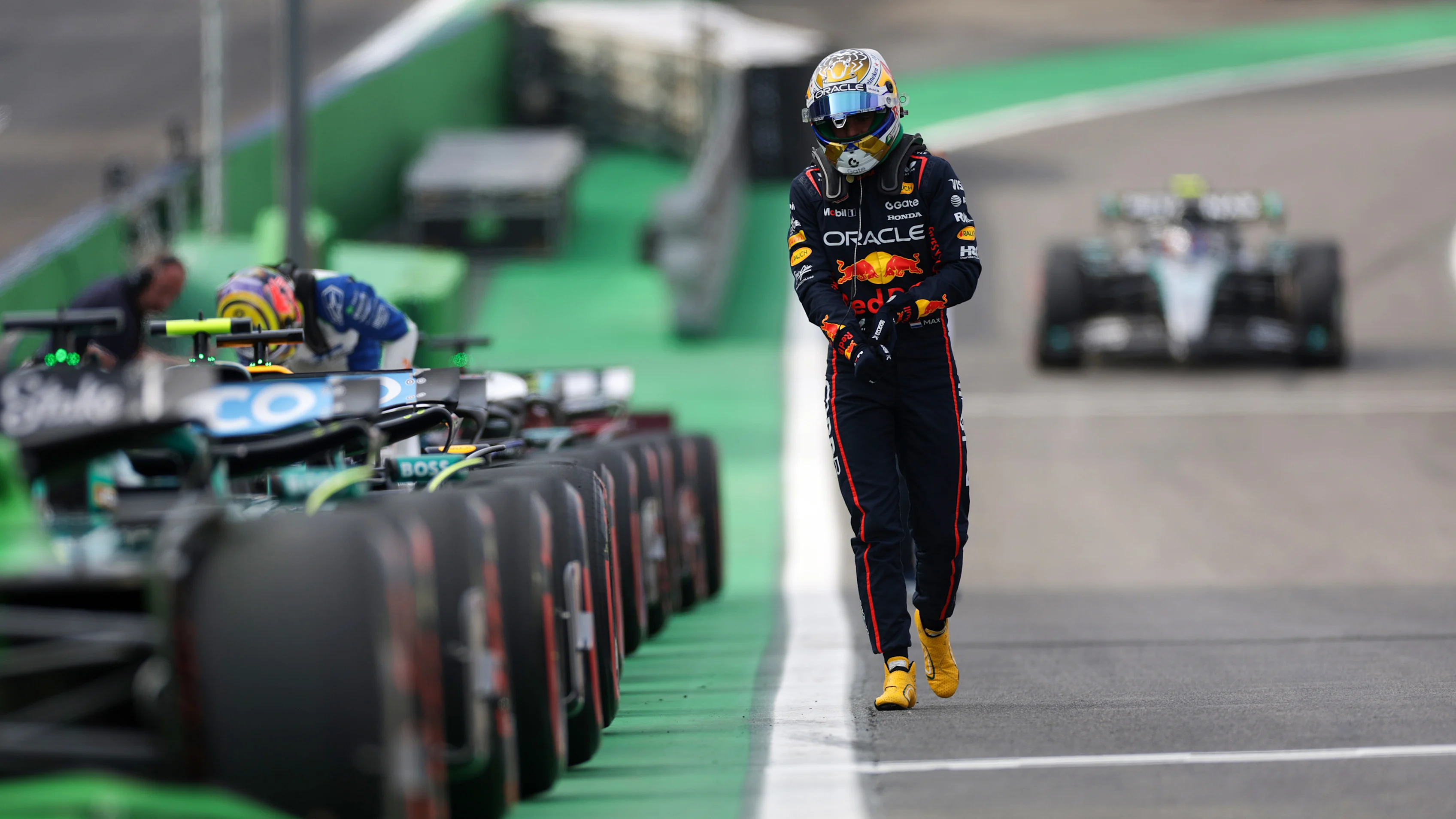 SAO PAULO, BRAZIL - NOVEMBER 07: Max Verstappen of the Netherlands and Oracle Red Bull Racing ewalks in parc ferme during Sprint Qualifying ahead of the F1 Grand Prix of Brazil at Autodromo Jose Carlos Pace on November 07, 2025 in Sao Paulo, Brazil. (Photo by Peter Fox/Getty Images)