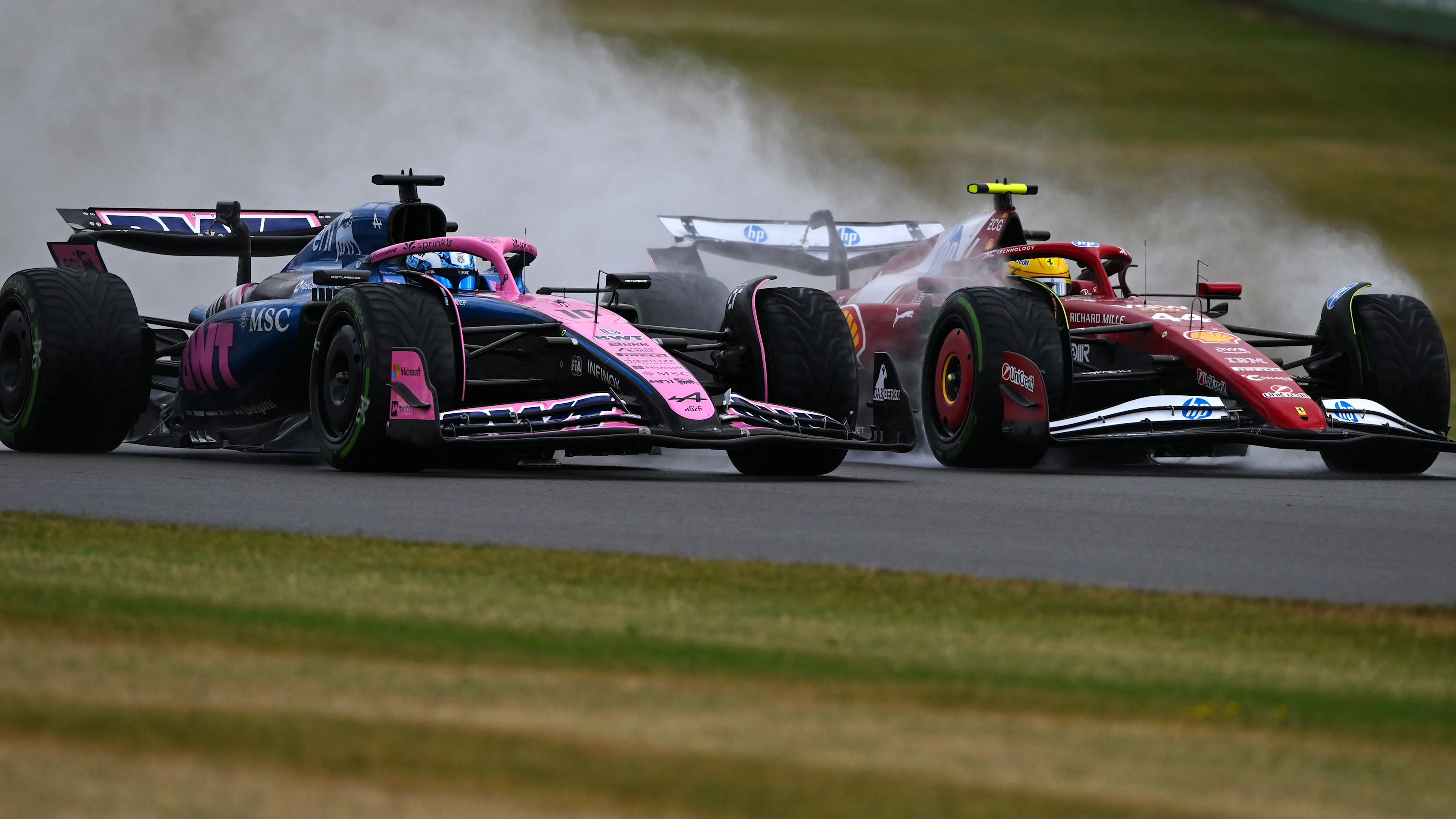 NORTHAMPTON, ENGLAND - JULY 06: Pierre Gasly of France driving the (10) Alpine F1 A525 Renault and Lewis Hamilton of Great Britain driving the (44) Scuderia Ferrari SF-25 battle for track position on track during the F1 Grand Prix of Great Britain at Silverstone Circuit on July 06, 2025 in Northampton, England. (Photo by Rudy Carezzevoli/Getty Images)