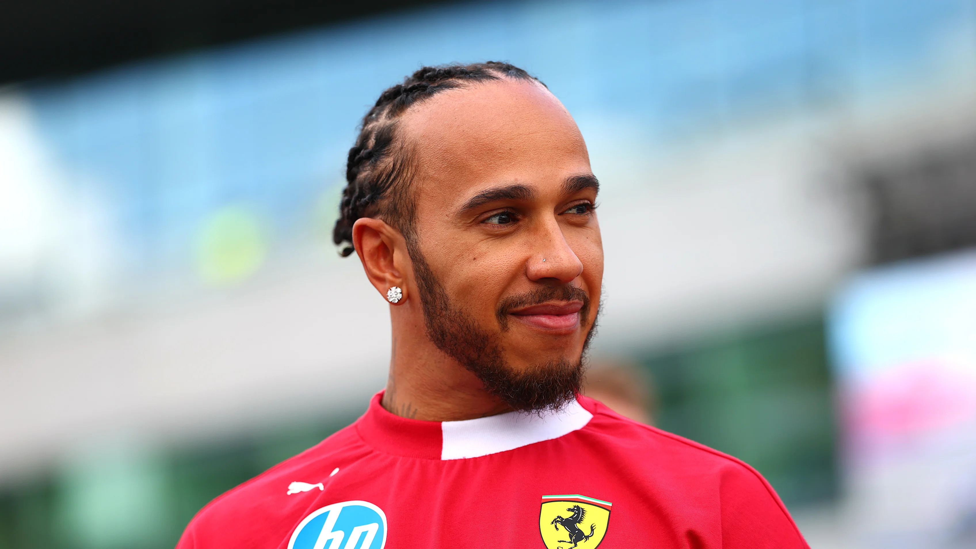 NORTHAMPTON, ENGLAND - JULY 03: Lewis Hamilton of Great Britain and Scuderia Ferrari looks on