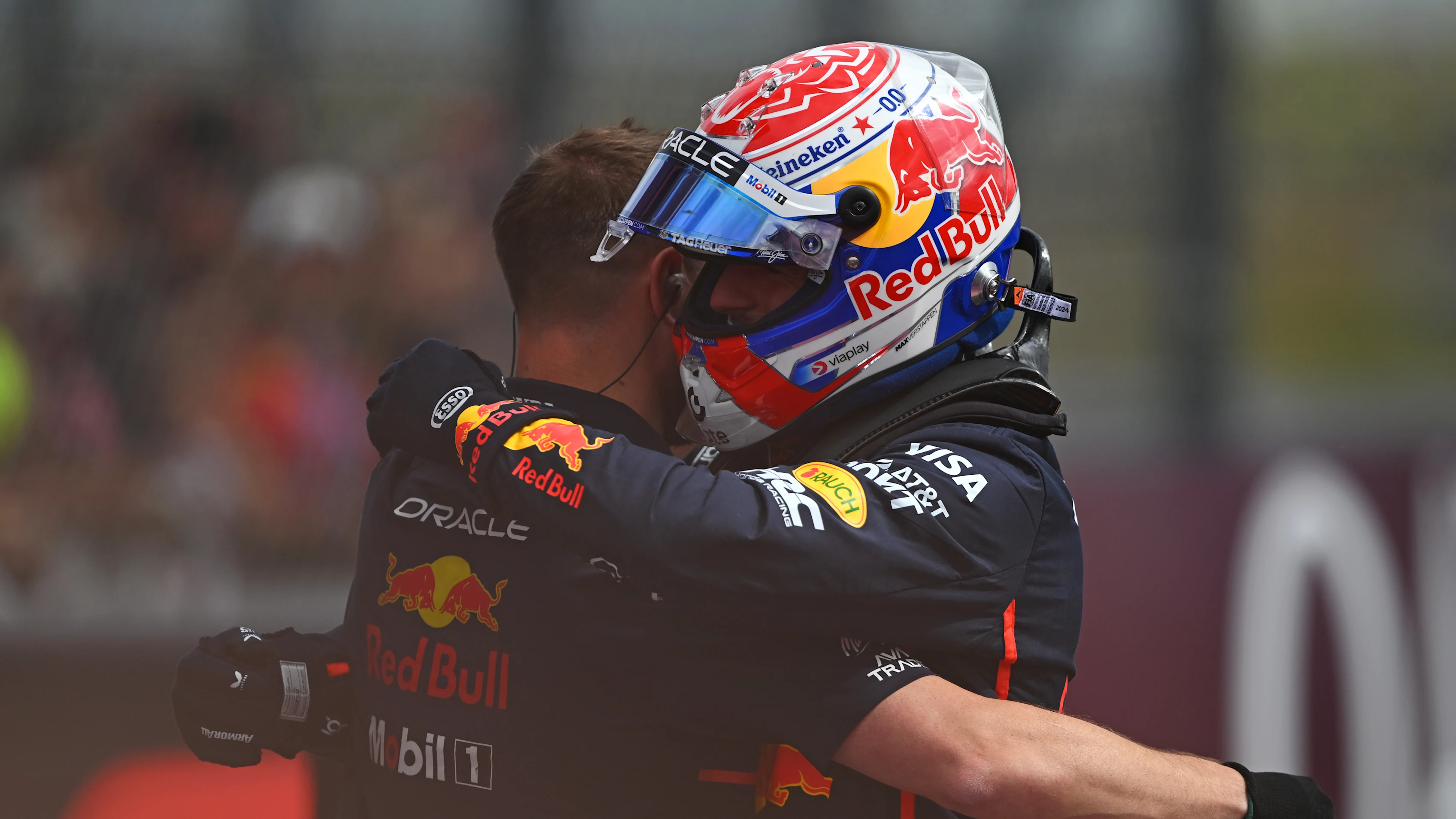 NORTHAMPTON, ENGLAND - JULY 05: Pole position qualifier Max Verstappen of the Netherlands and Oracle Red Bull Racing celebrates with a teammate in parc ferme during qualifying ahead of the F1 Grand Prix of Great Britain at Silverstone Circuit on July 05, 2025 in Northampton, England. (Photo by Rudy Carezzevoli/Getty Images)