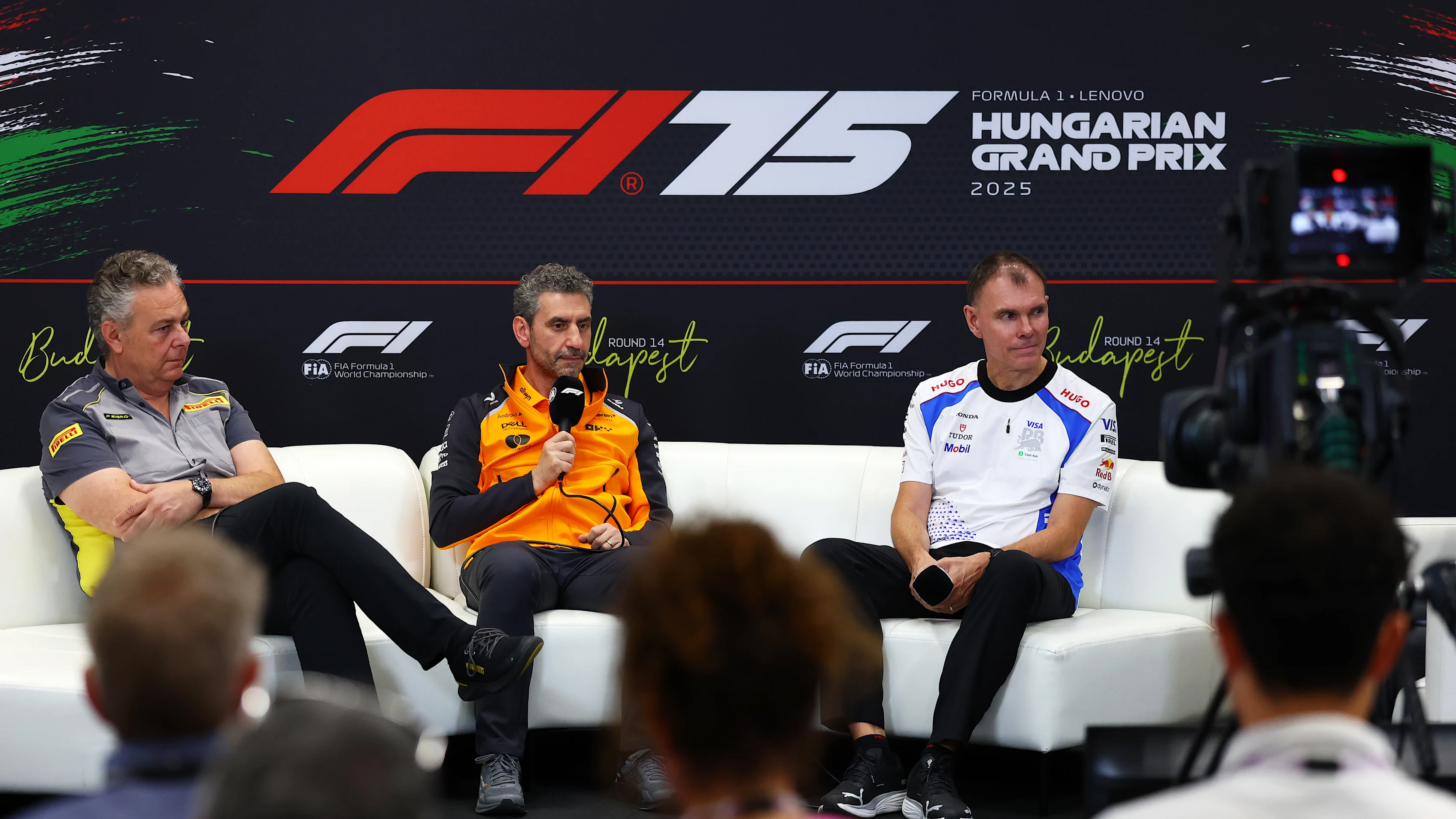 BUDAPEST, HUNGARY - AUGUST 01: Mario Isola, Director of Pirelli F1 Andrea Stella, Team Principal of