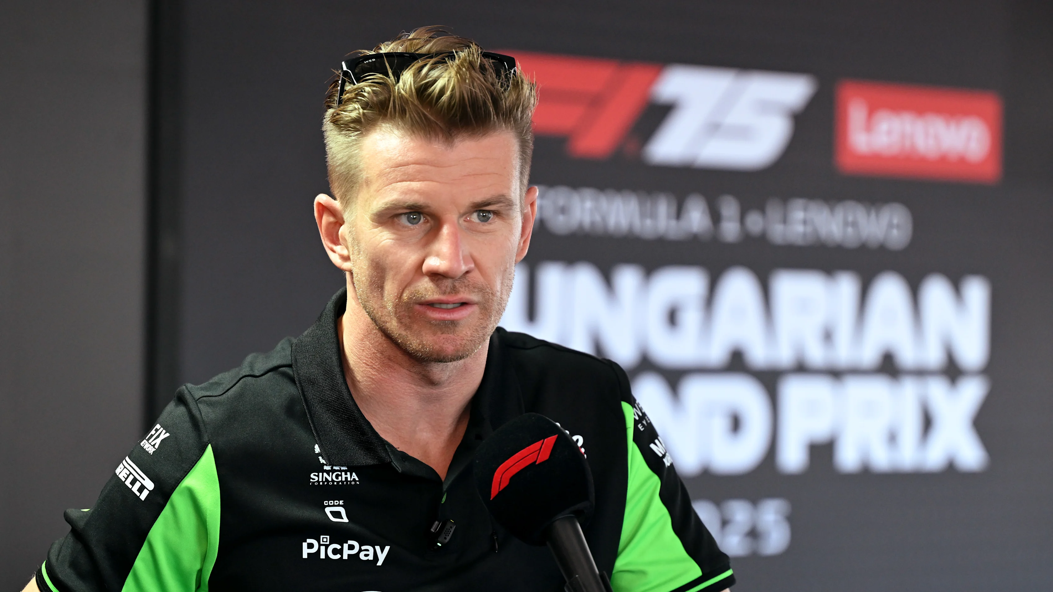 BUDAPEST, HUNGARY - JULY 31: Nico Hulkenberg of Germany and Stake F1 Team Kick Sauber talks to the