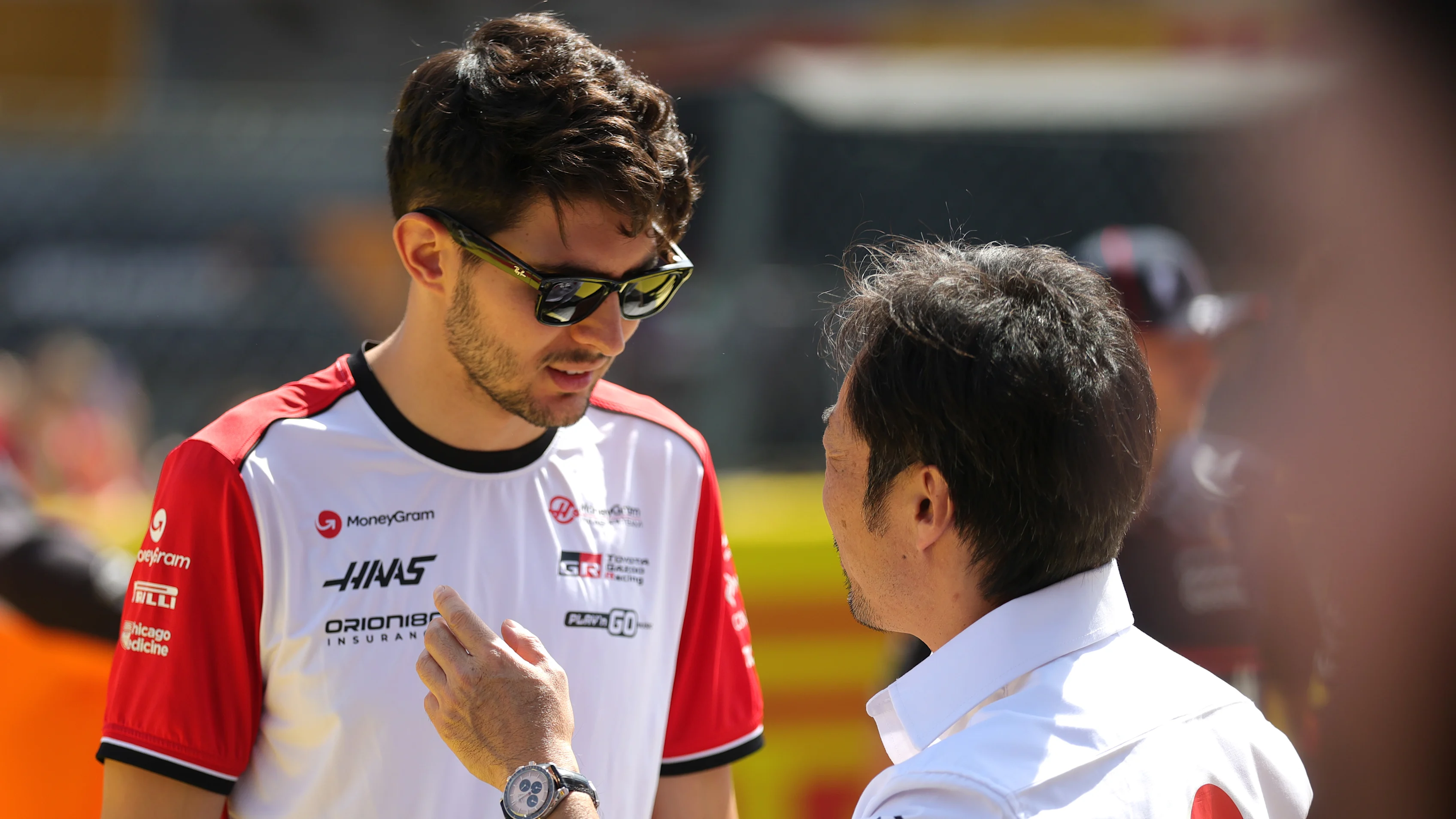 MONZA, ITALY - SEPTEMBER 07: Esteban Ocon of France and Haas F1 and Ayao Komatsu, Team Principal of
