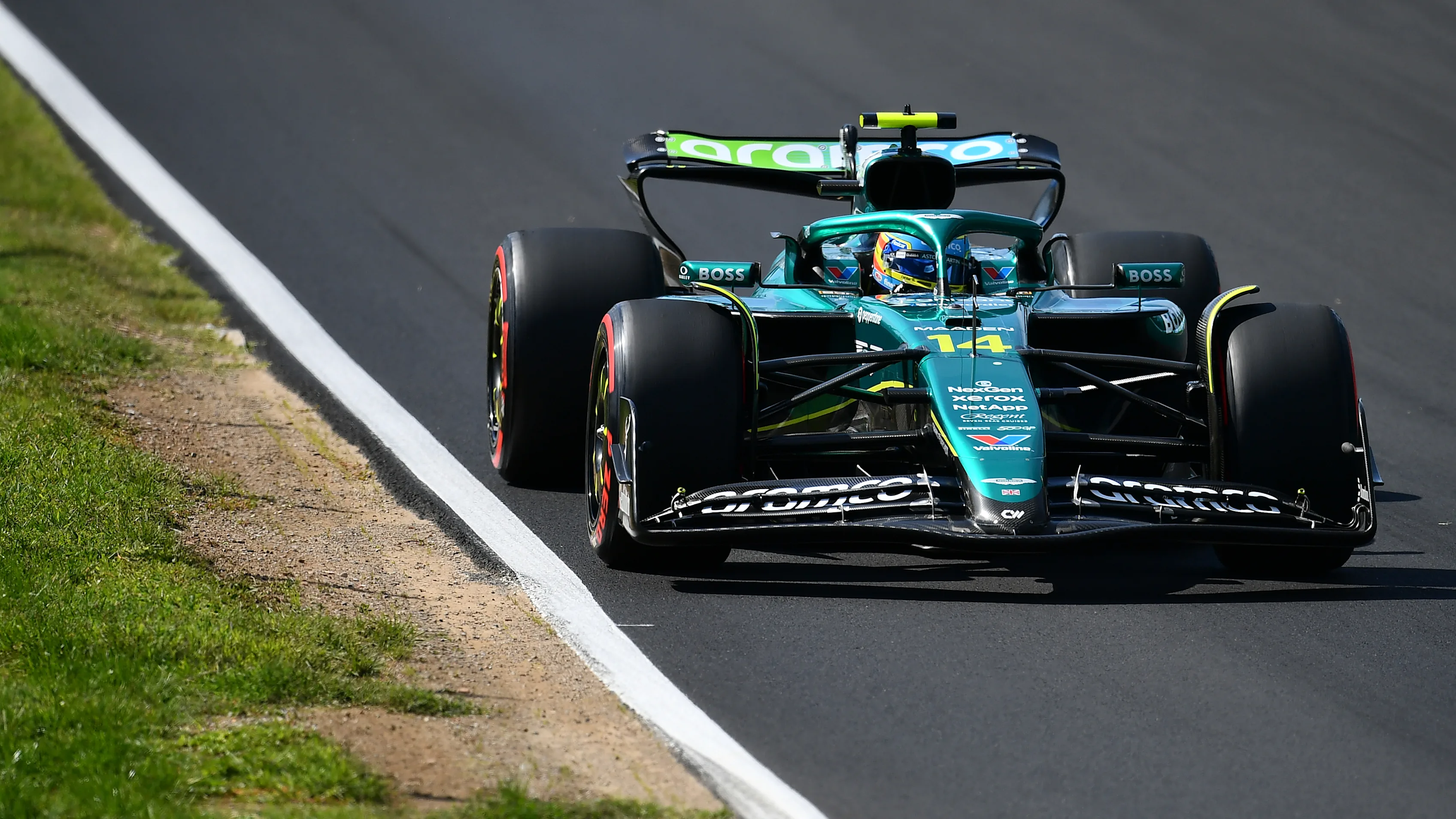 MONZA, ITALY - SEPTEMBER 07: Fernando Alonso of Spain driving the (14) Aston Martin F1 Team AMR25 Mercedes heads to the grid prior to the F1 Grand Prix of Italy at Autodromo Nazionale Monza on September 07, 2025 in Monza, Italy. (Photo by James Sutton - Formula 1/Formula 1 via Getty Images)