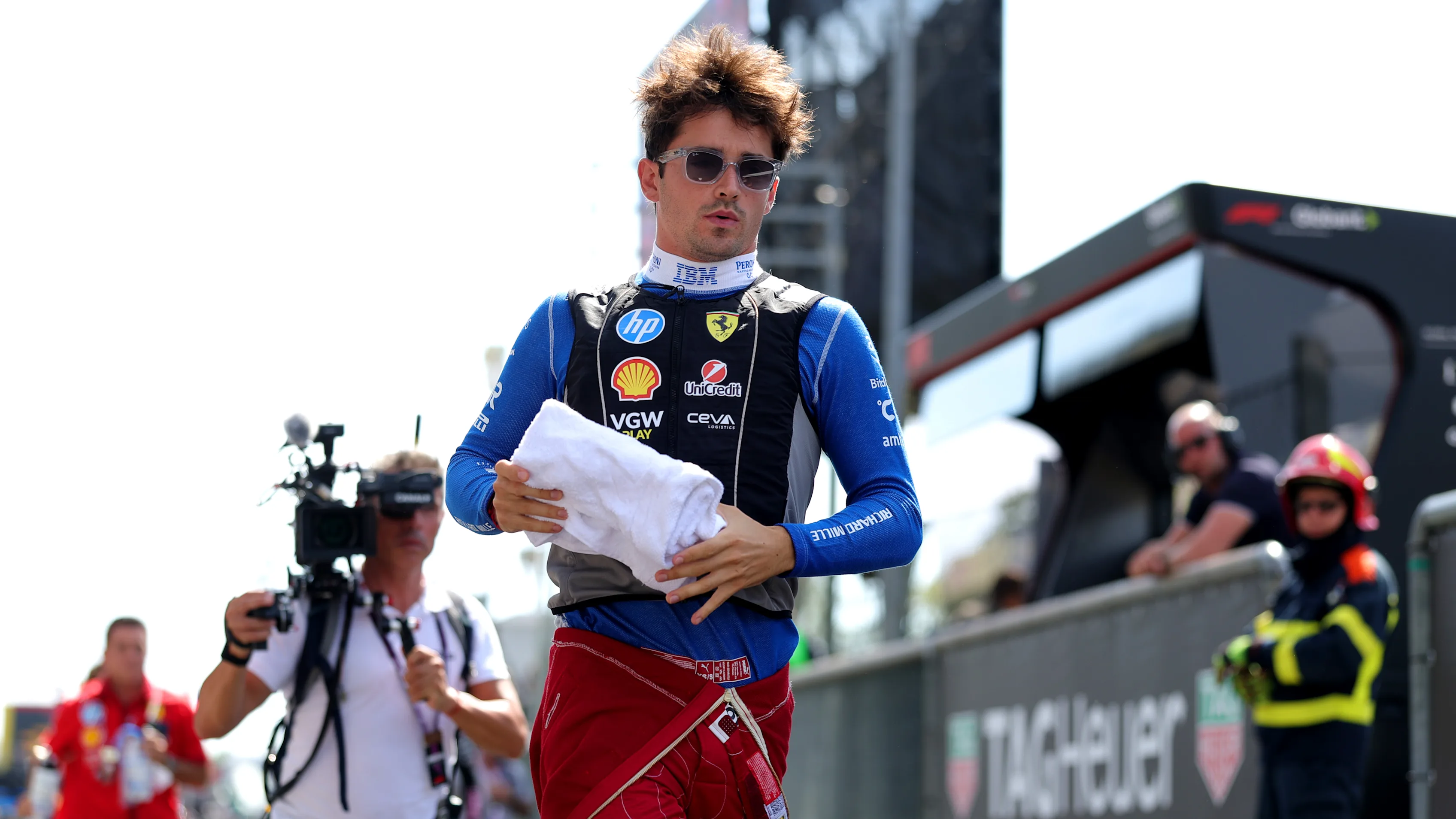 MONZA, ITALY - SEPTEMBER 07: Charles Leclerc of Monaco and Scuderia Ferrari runs in the Pitlane
