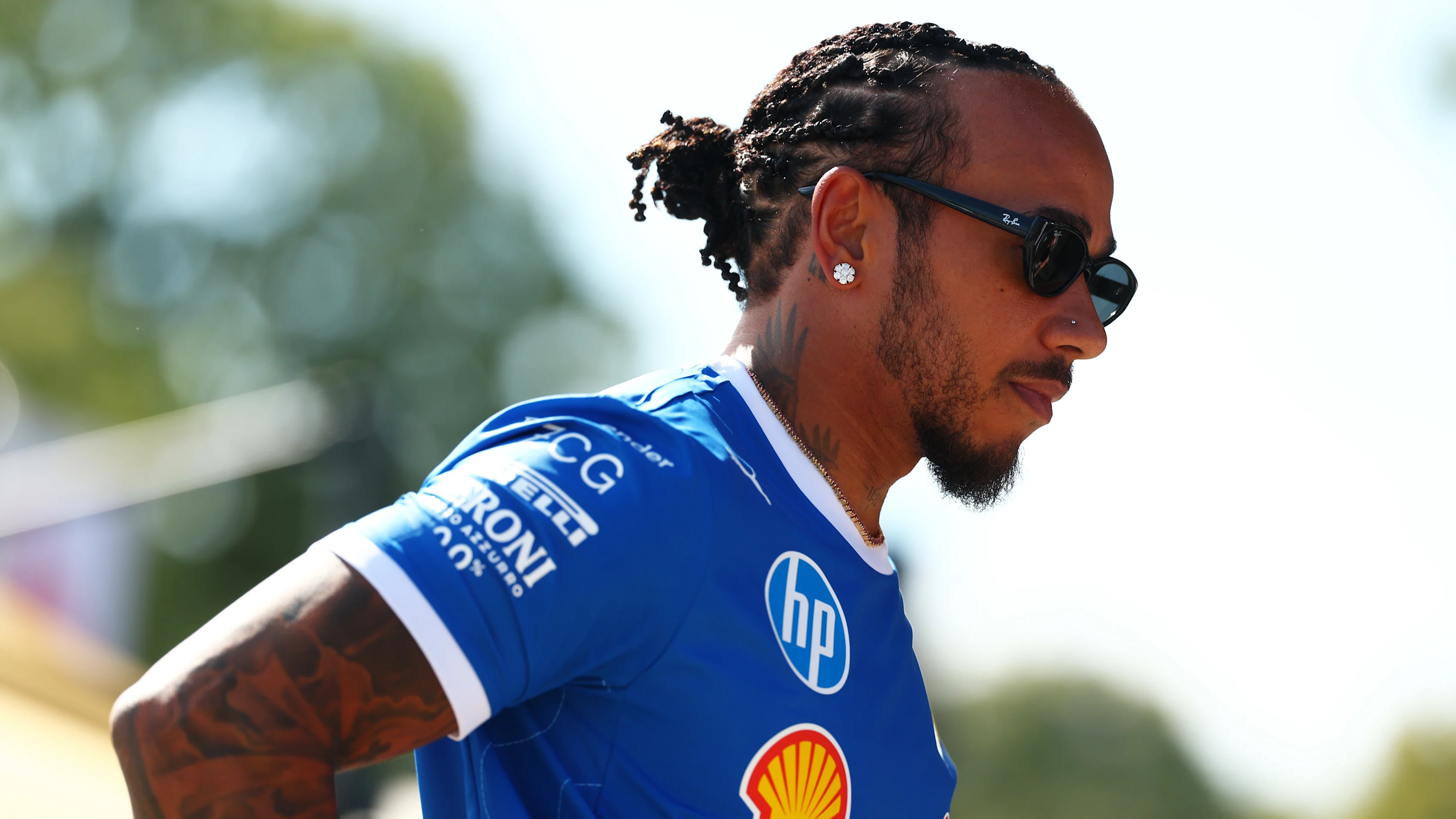 MONZA, ITALY - SEPTEMBER 04: Lewis Hamilton of Great Britain and Scuderia Ferrari arrives in the