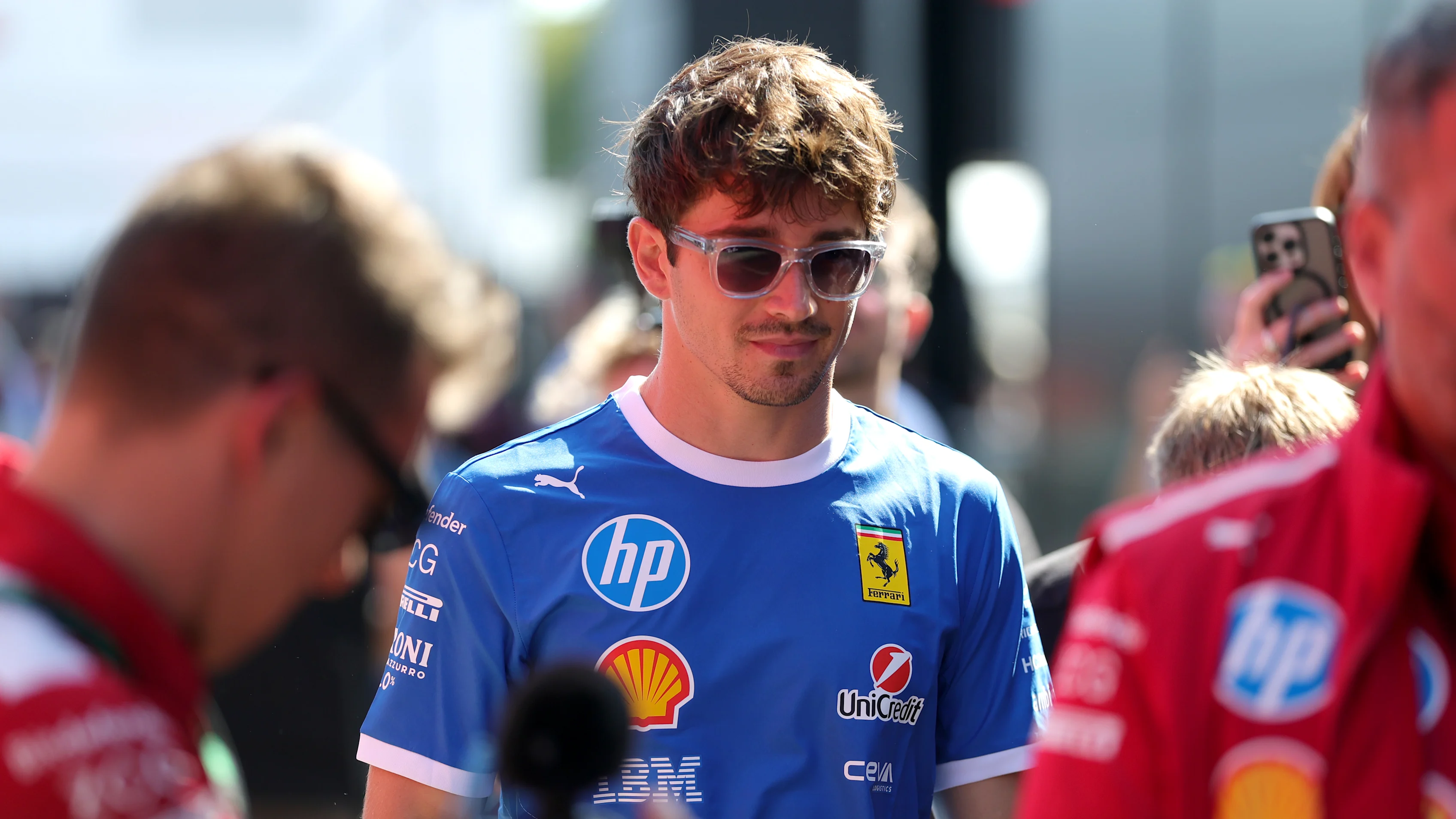MONZA, ITALY - SEPTEMBER 04: Charles Leclerc of Monaco and Scuderia Ferrari arrives in the Paddock
