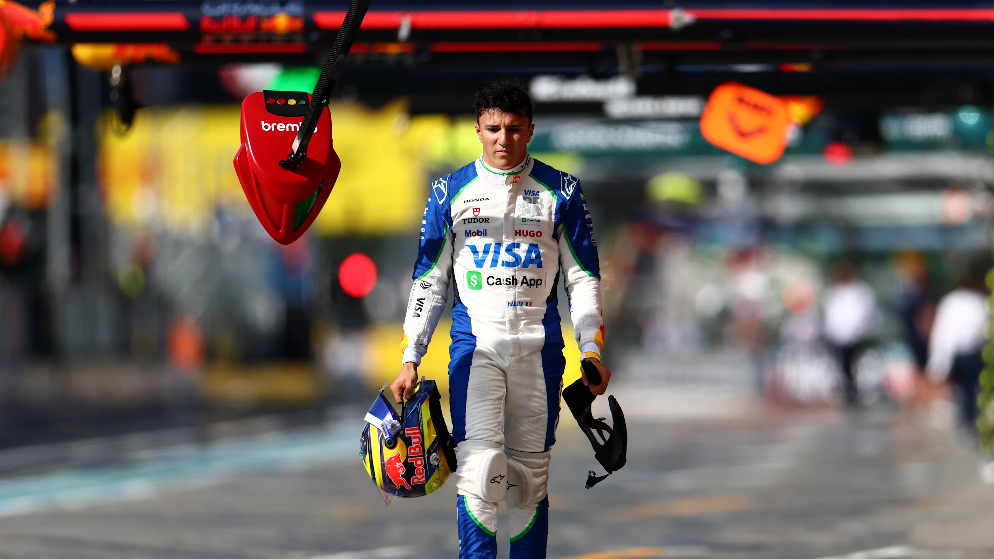 MONZA, ITALY - SEPTEMBER 06: Sixteenth placed qualifier Isack Hadjar of France and Visa Cash App