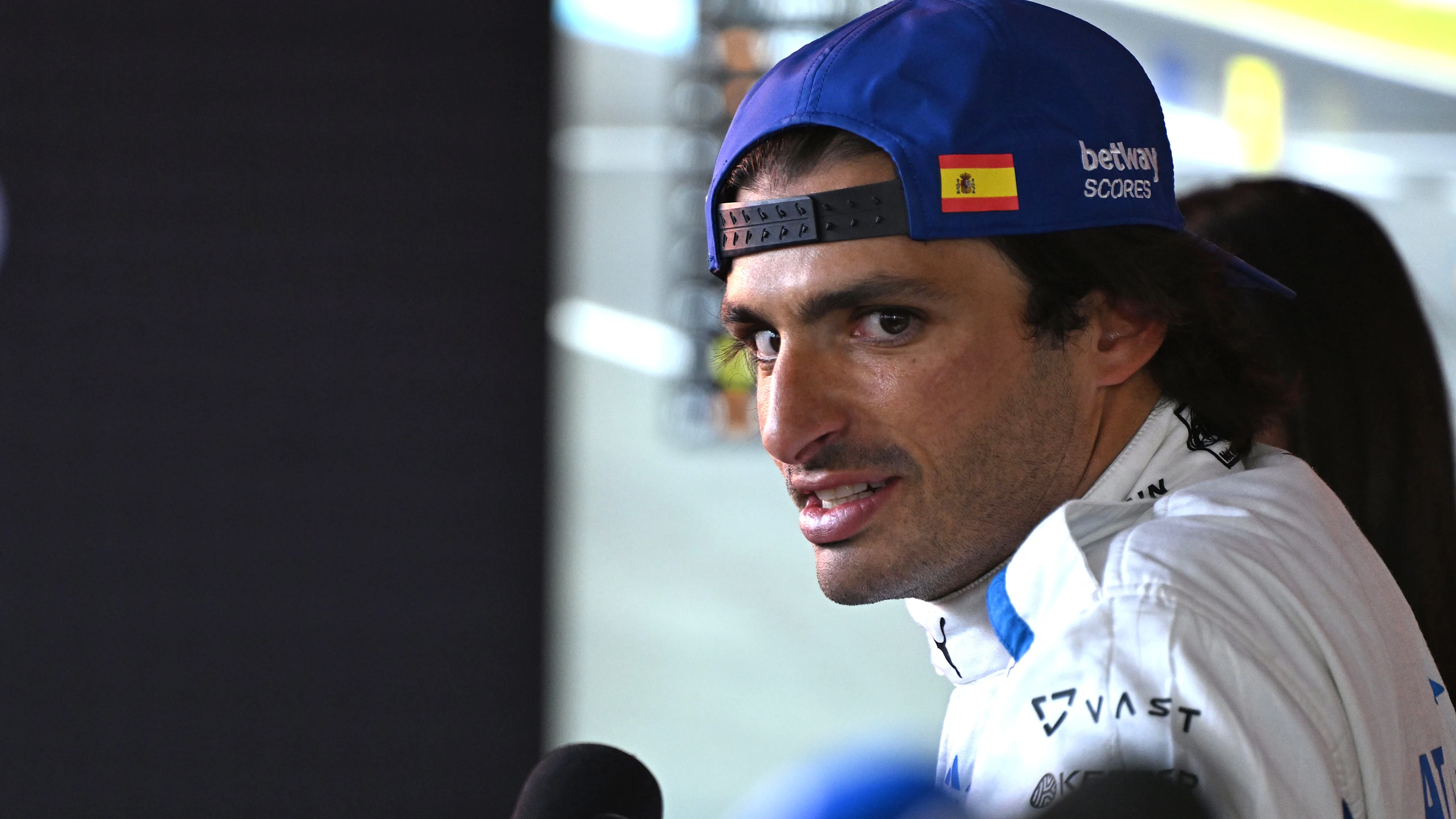 MONZA, ITALY - SEPTEMBER 06: Thirteenth placed qualifier Carlos Sainz of Spain and Williams is interviewed during qualifying ahead of the F1 Grand Prix of Italy at Autodromo Nazionale Monza on September 06, 2025 in Monza, Italy. (Photo by Mark Sutton - Formula 1/Formula 1 via Getty Images)