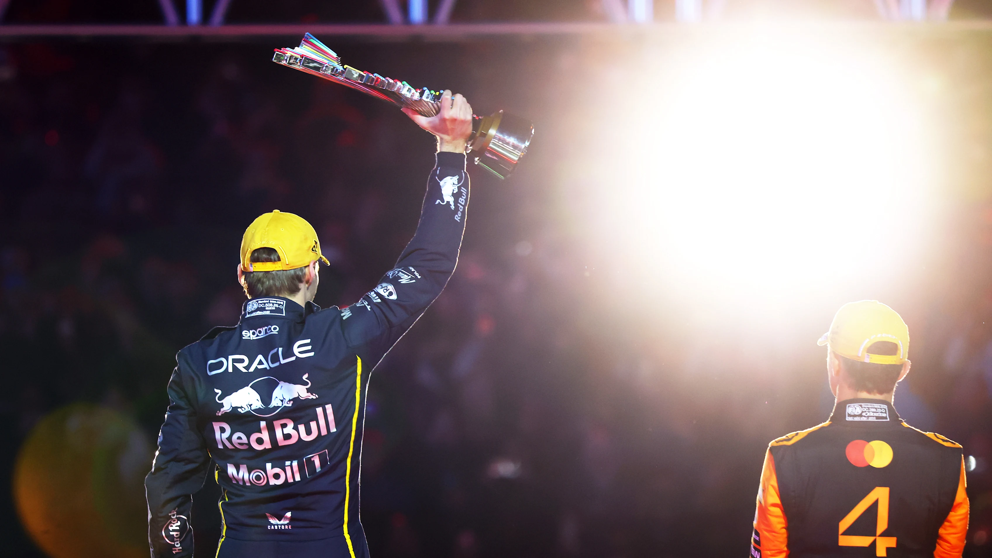 LAS VEGAS, NEVADA - NOVEMBER 22: Race winner Max Verstappen of the Netherlands and Oracle Red Bull Racing lifts his trophy on the podium during the F1 Grand Prix of Las Vegas at Las Vegas Strip Circuit on November 22, 2025 in Las Vegas, Nevada. (Photo by Mark Thompson/Getty Images)