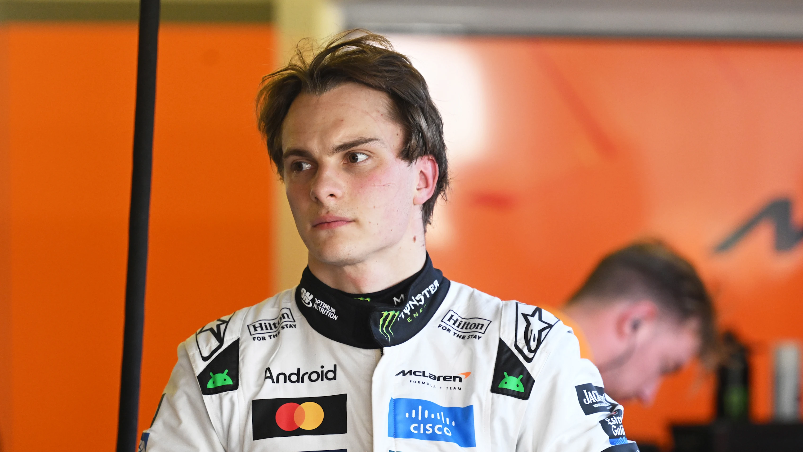 MEXICO CITY, MEXICO - OCTOBER 24: Oscar Piastri of Australia and McLaren looks on in the garage