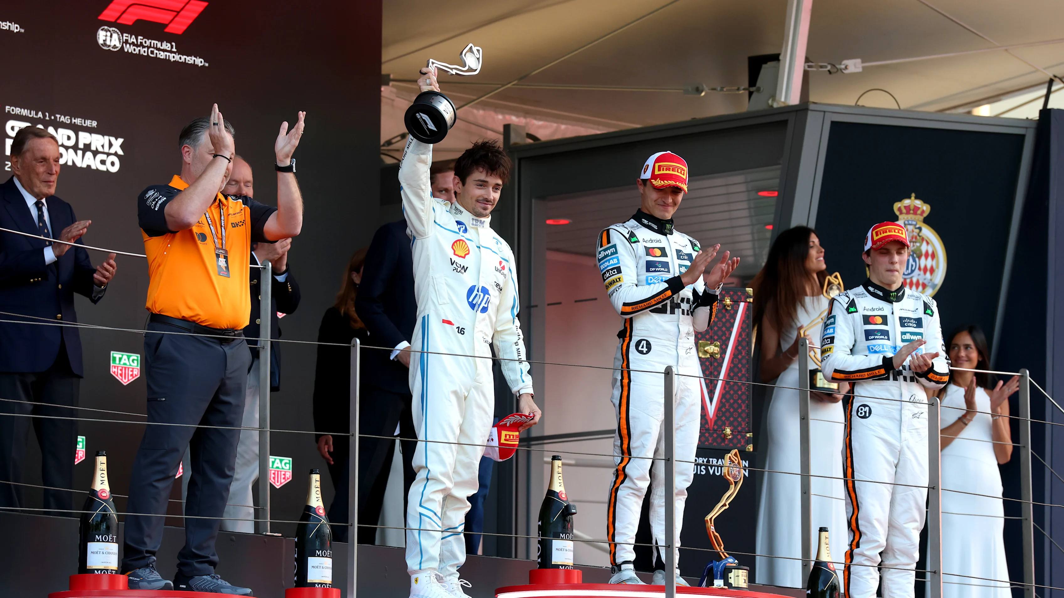 MONTE-CARLO, MONACO - MAY 25: Second placed Charles Leclerc of Monaco and Scuderia Ferrari lifts