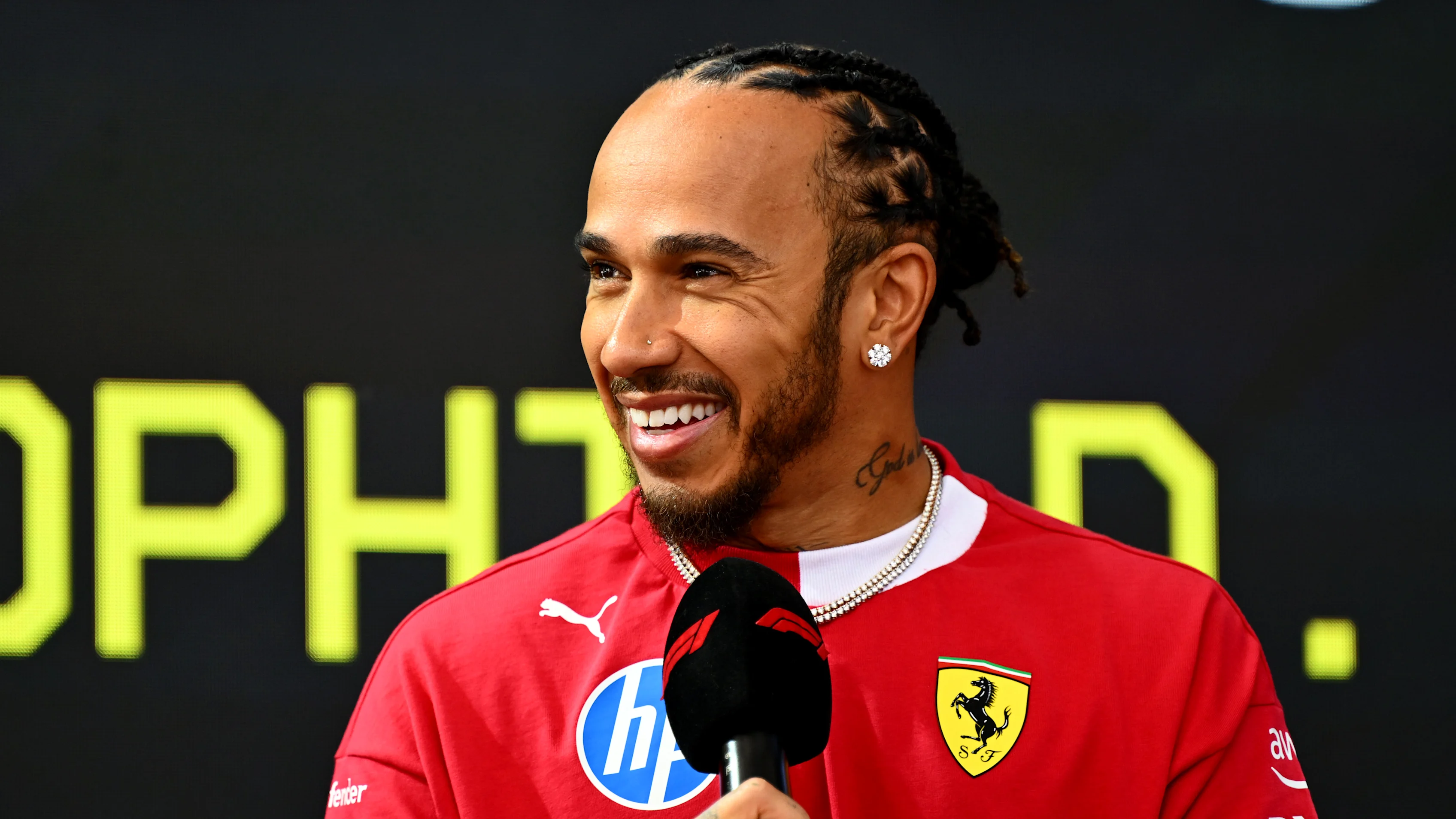 MONTE-CARLO, MONACO - MAY 23: Lewis Hamilton of Great Britain and Scuderia Ferrari on stage prior