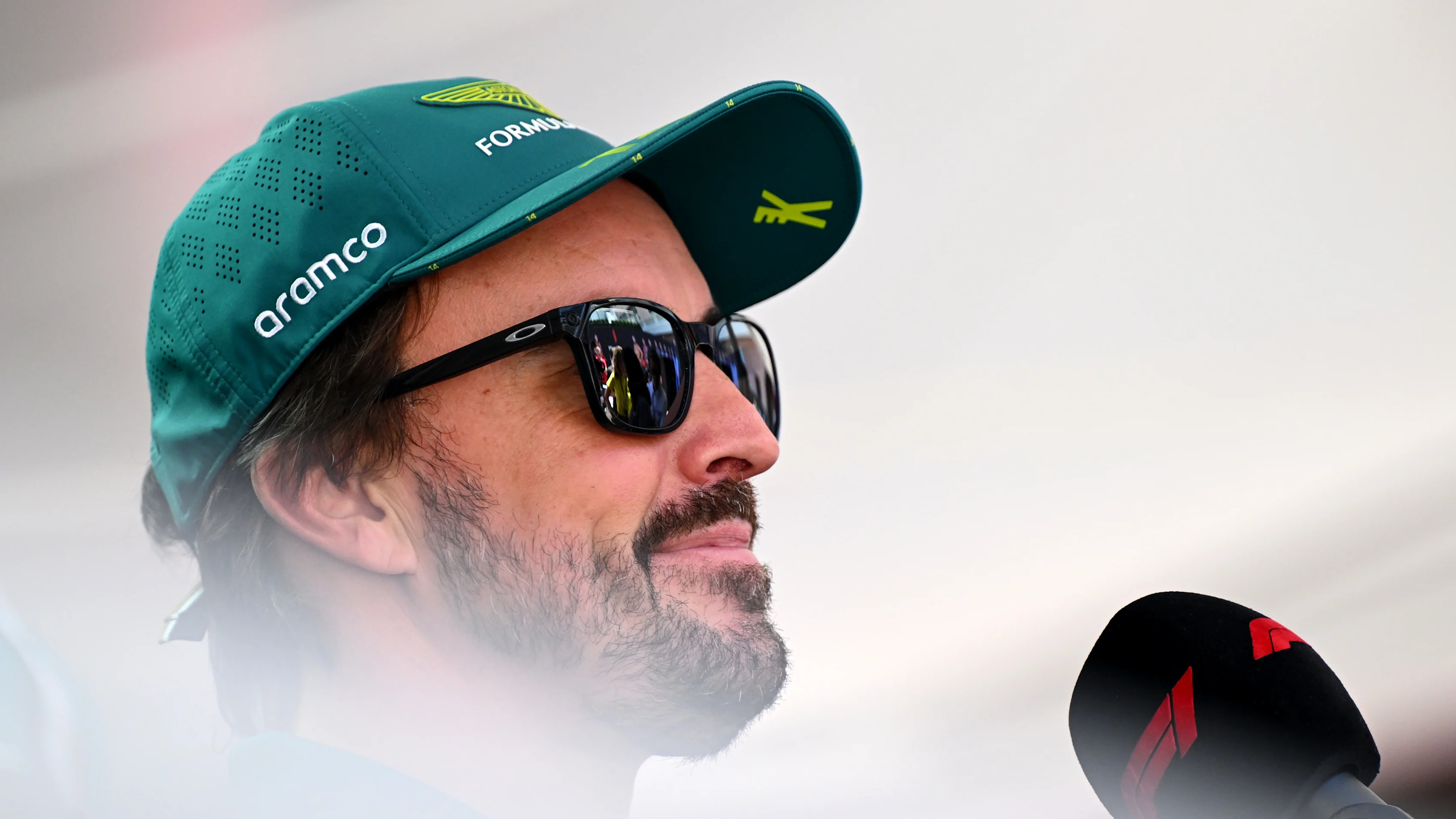 MONTE-CARLO, MONACO - MAY 22: Fernando Alonso of Spain and Aston Martin F1 Team talks to the media