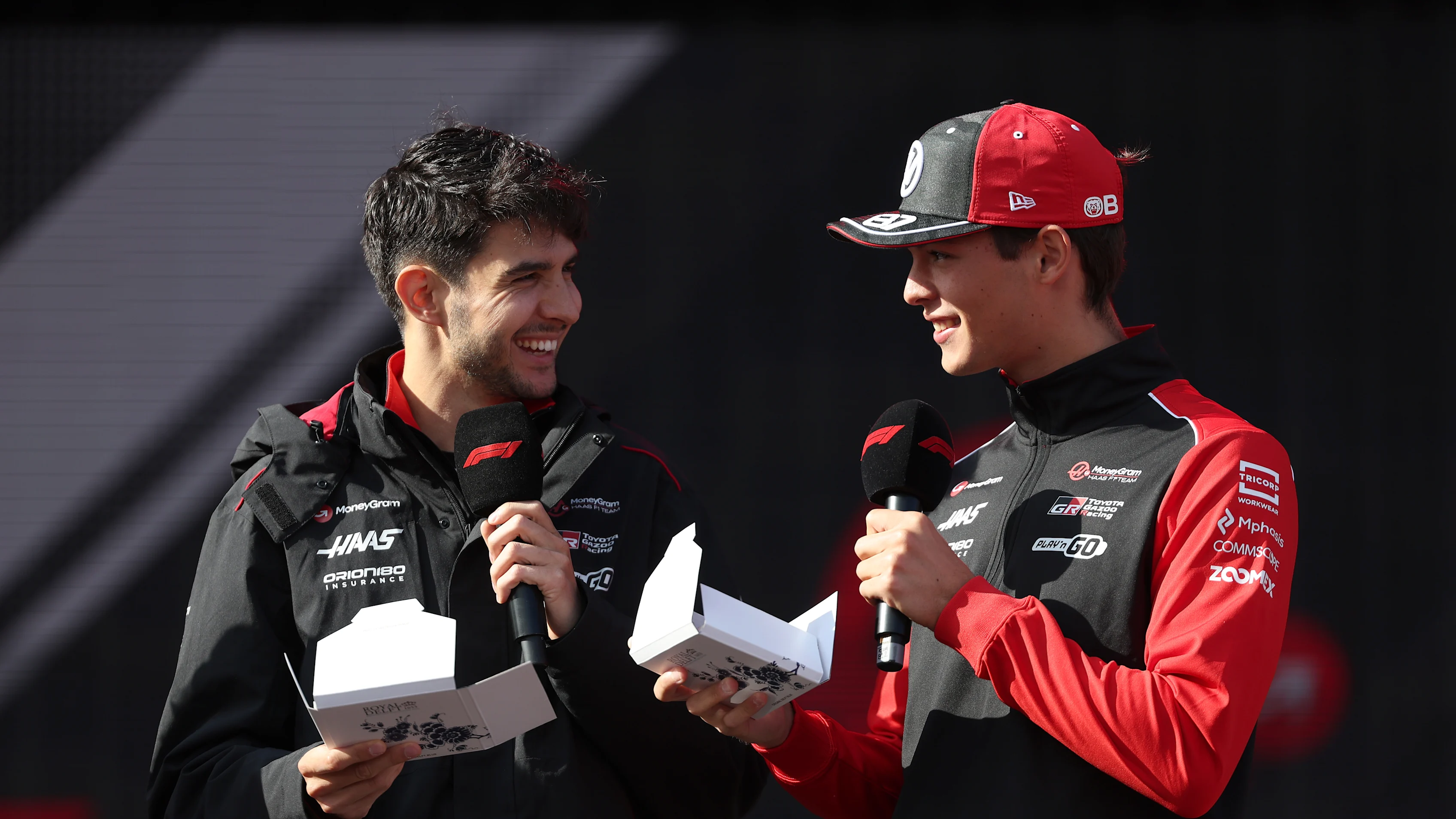 ZANDVOORT, NETHERLANDS - AUGUST 30: Esteban Ocon of France and Haas F1 and Oliver Bearman of Great