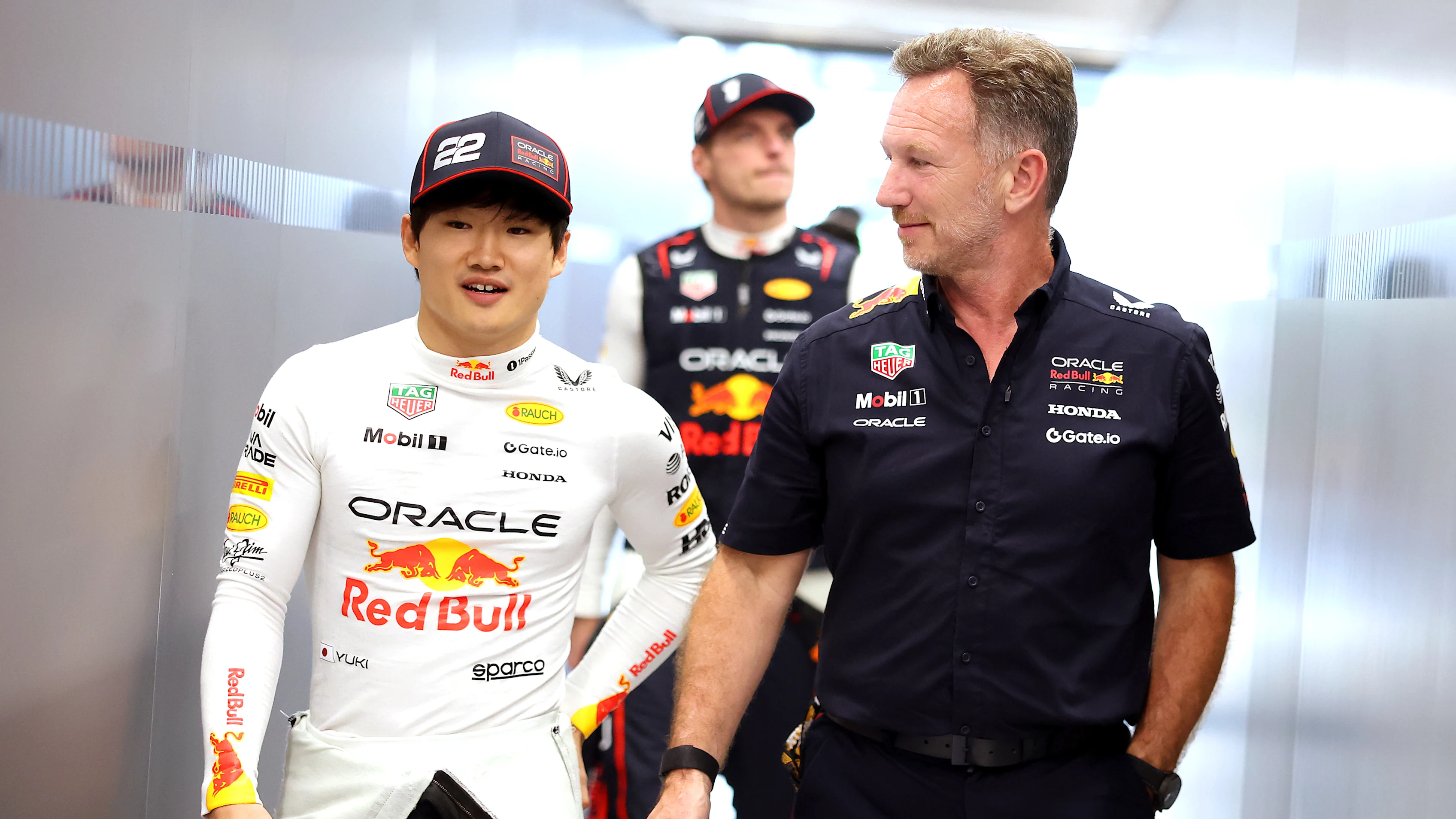 JEDDAH, SAUDI ARABIA - APRIL 18: Yuki Tsunoda of Japan and Oracle Red Bull Racing talks with