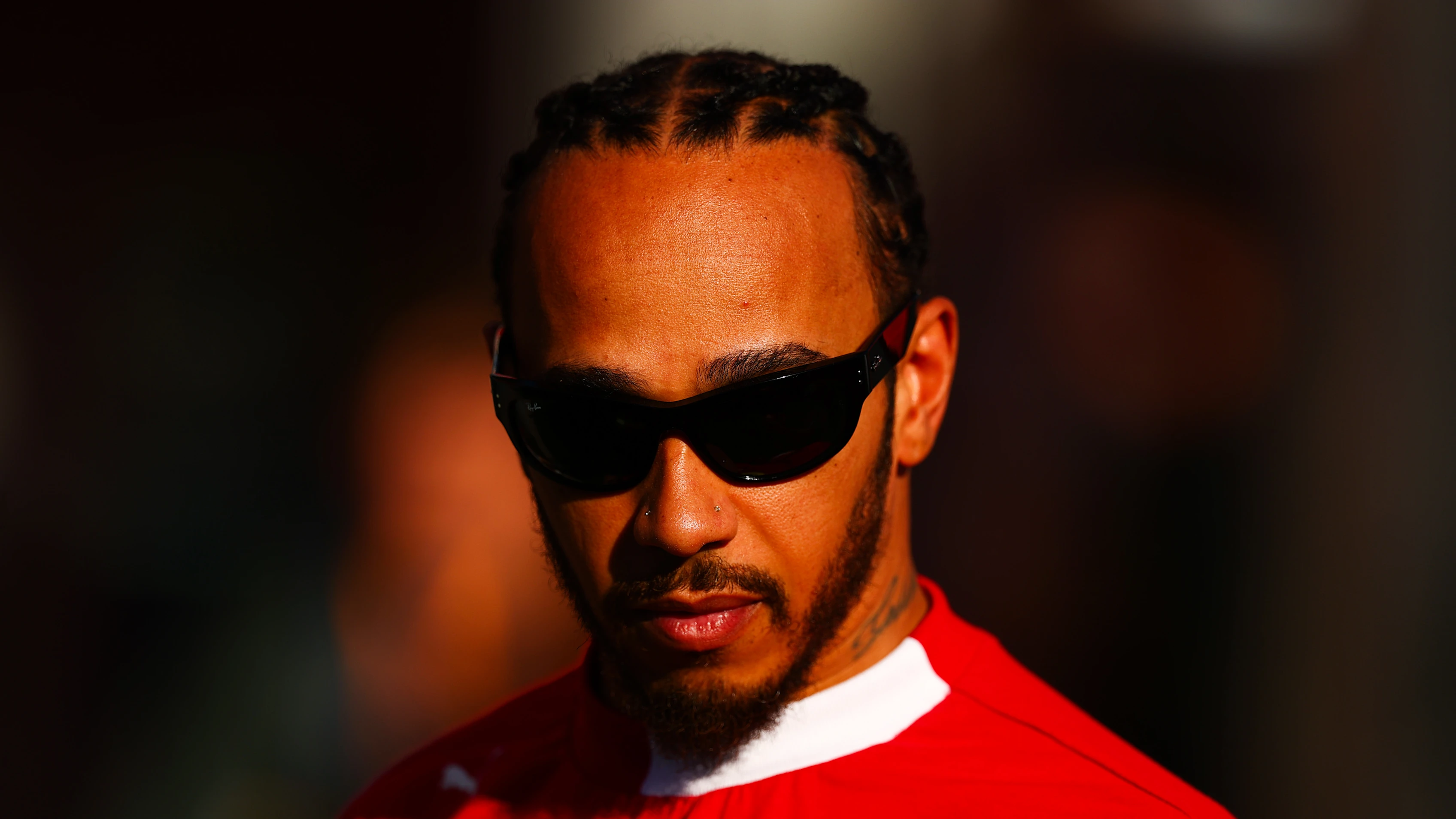 BARCELONA, SPAIN - MAY 30: Lewis Hamilton of Great Britain and Scuderia Ferrari looks on during