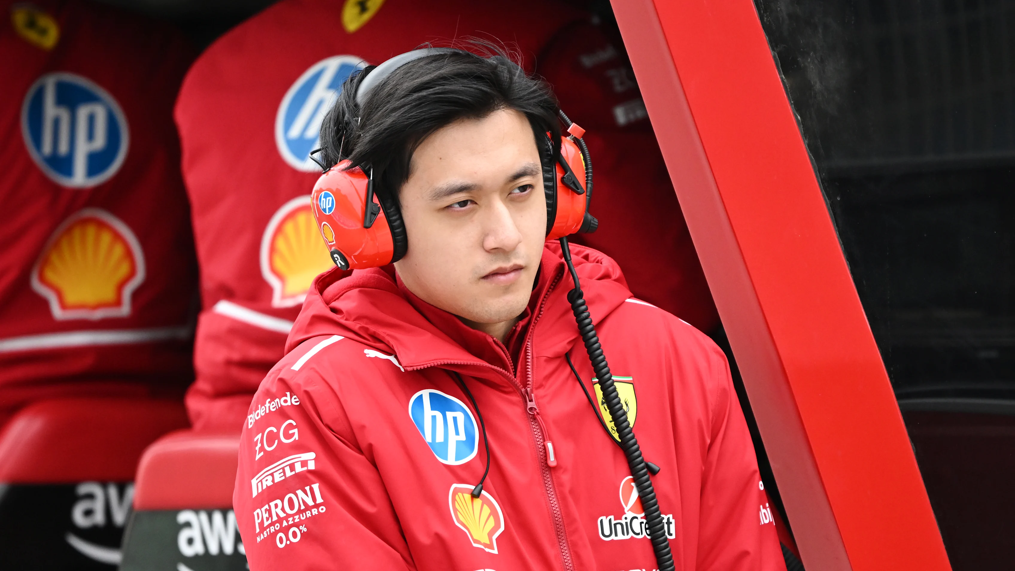 BAHRAIN, BAHRAIN - FEBRUARY 26: Zhou Guanyu of China and Scuderia Ferrari looks on in the Pitlane