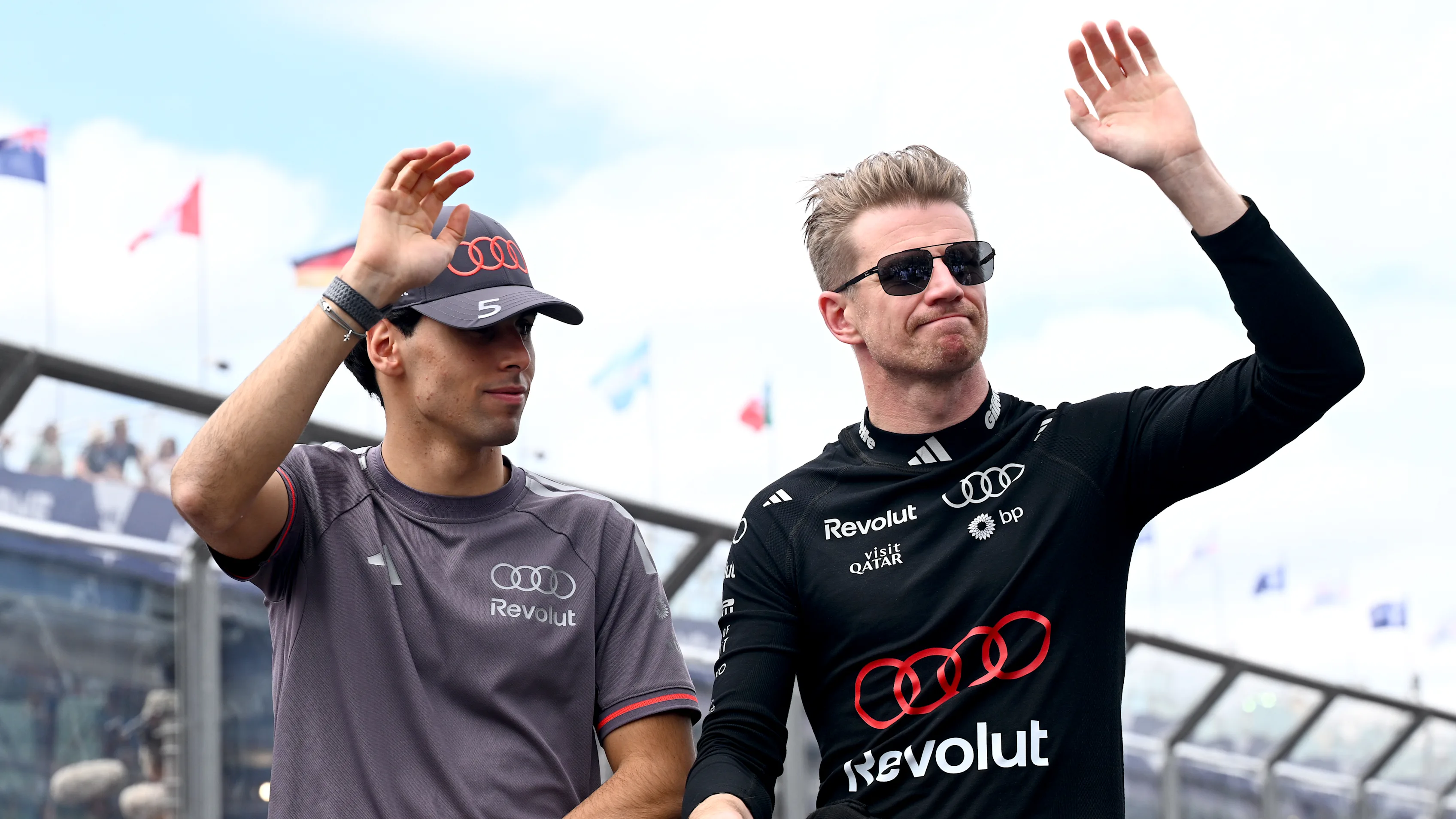 MELBOURNE, AUSTRALIA - MARCH 08: Gabriel Bortoleto of Brazil and Audi F1 Team and Nico Hulkenberg of Germany and Audi F1 Team on the drivers parade prior to the F1 Grand Prix of Australia at Albert Park Grand Prix Circuit on March 08, 2026 in Melbourne, Australia. (Photo by Mark Sutton - Formula 1/Formula 1 via Getty Images)