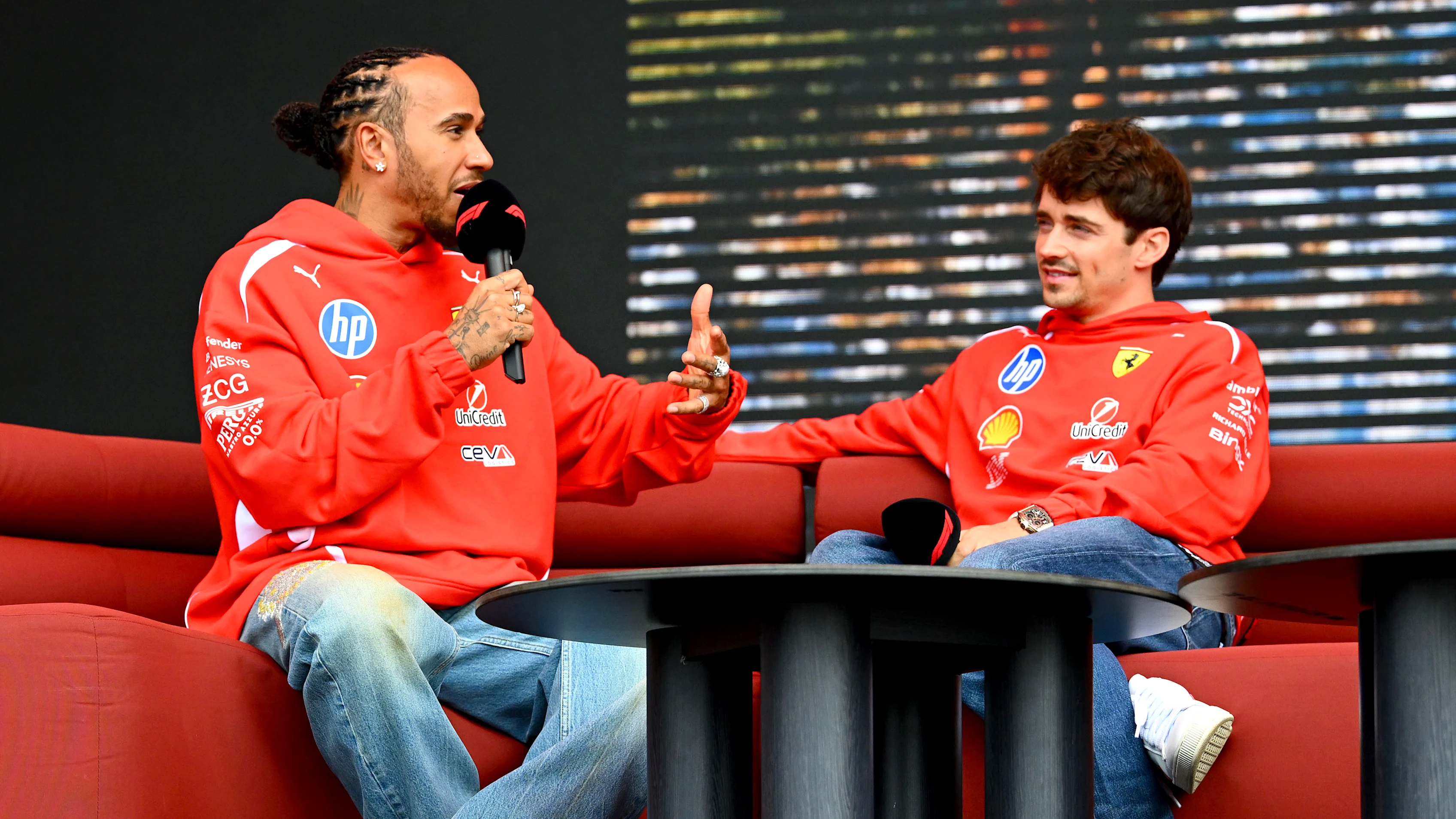 MELBOURNE, AUSTRALIA - MARCH 06: Lewis Hamilton of Great Britain and Scuderia Ferrari and Charles