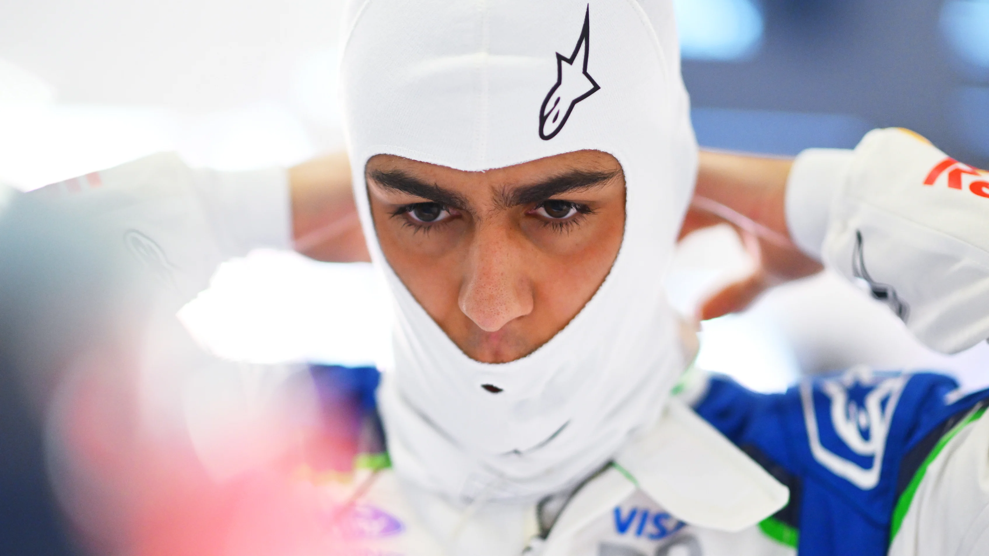 SHANGHAI, CHINA - MARCH 15: Arvid Lindblad of Great Britain and Visa Cash App Racing Bulls adjusts