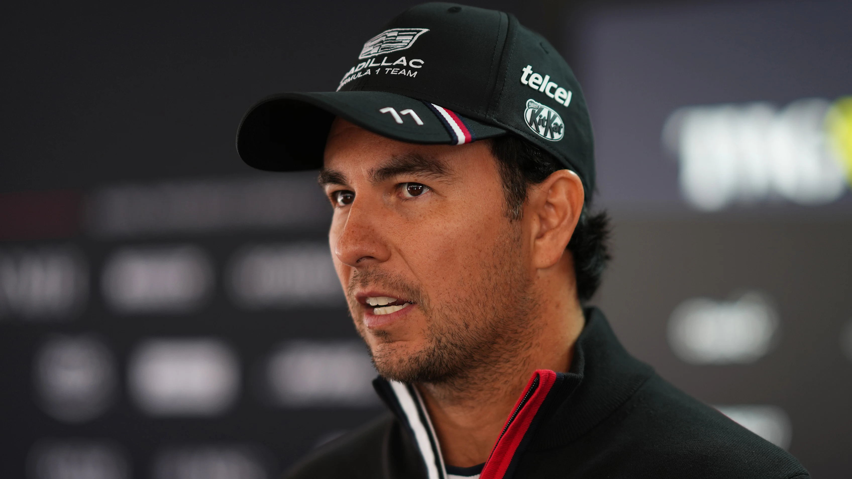 SHANGHAI, CHINA - MARCH 12: Sergio Perez of Mexico and Cadillac F1 Team talks to the media during