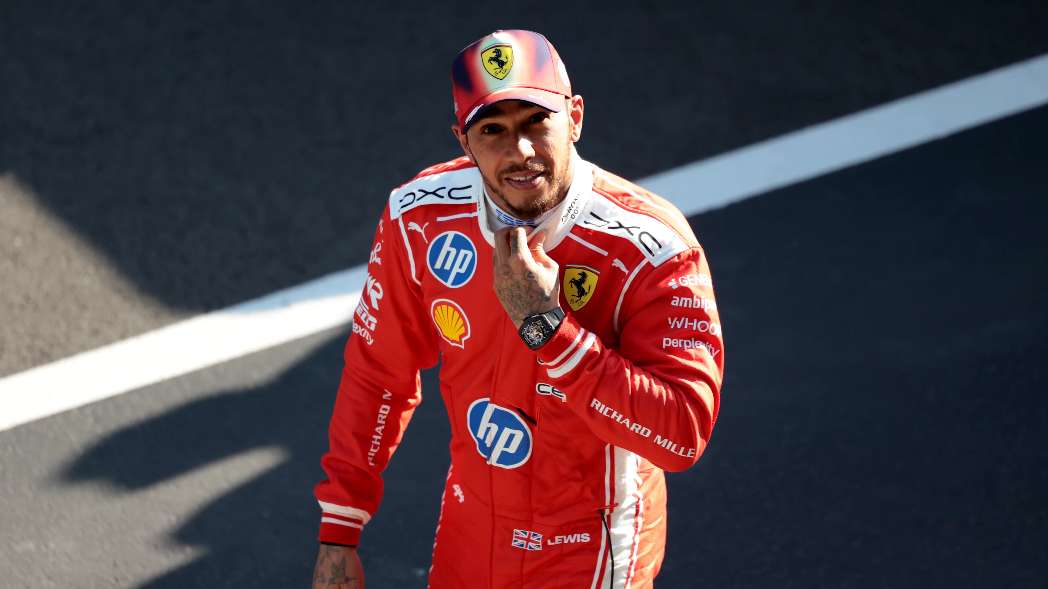 SHANGHAI, CHINA - MARCH 14: Third placed qualifier Lewis Hamilton of Great Britain and Scuderia Ferrari looks on in parc ferme during qualifying ahead of the F1 Grand Prix of China at Shanghai International Circuit on March 14, 2026 in Shanghai, China. (Photo by Anni Graf - Formula 1/Formula 1 via Getty Images)