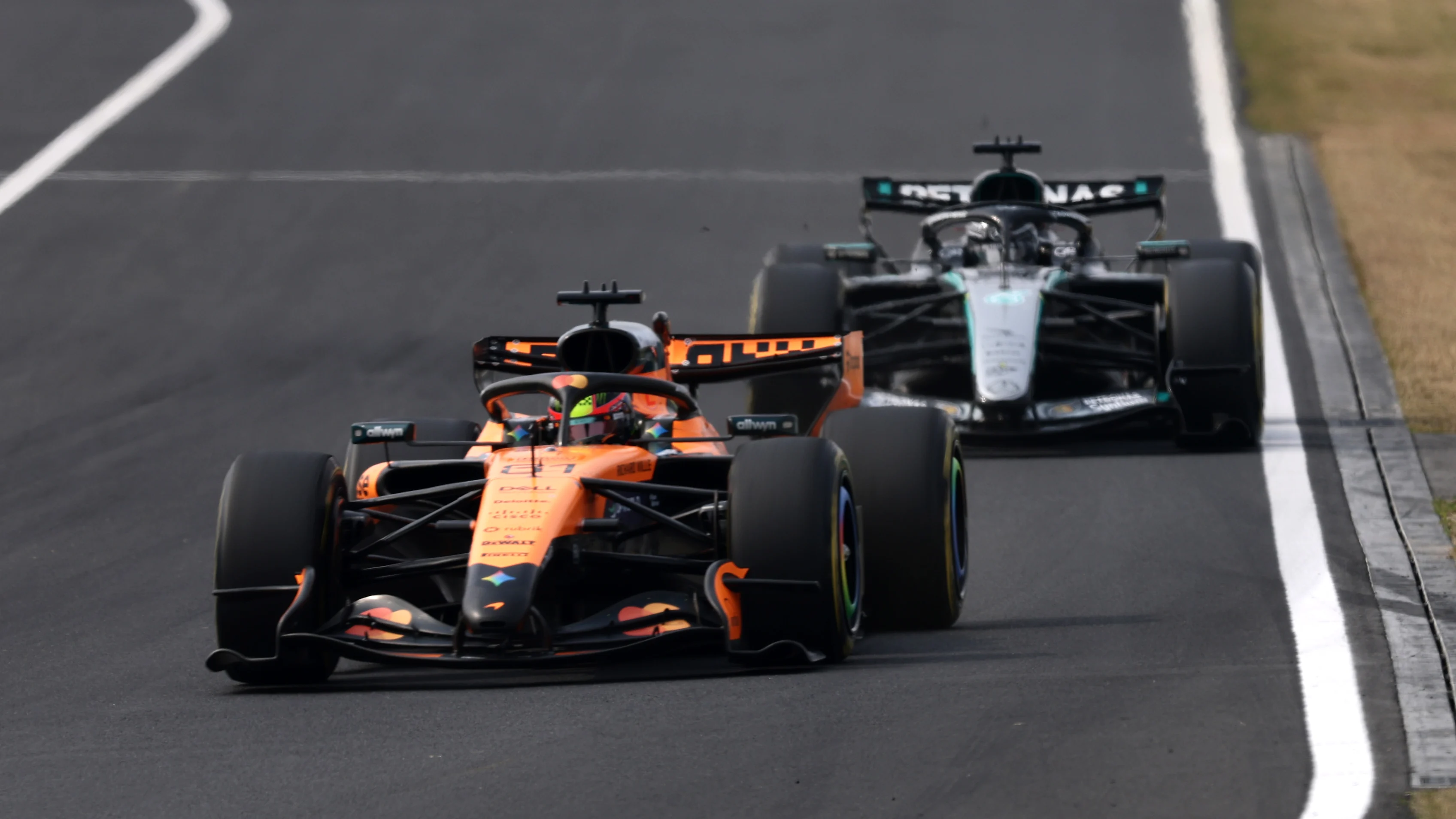SUZUKA, JAPAN - MARCH 29: Oscar Piastri of Australia driving the (81) McLaren MCL40 Mercedes leads