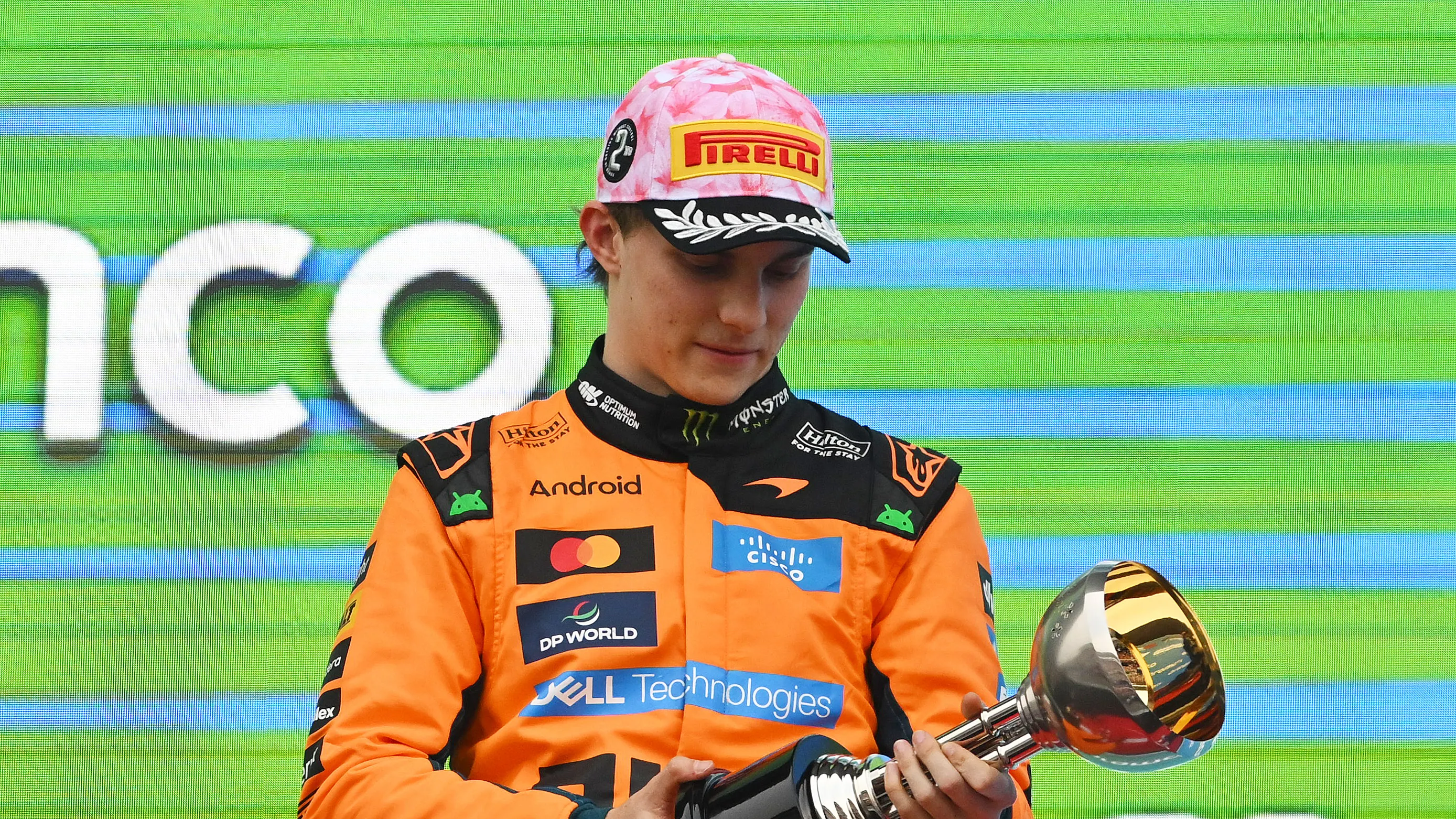 SUZUKA, JAPAN - MARCH 29: Second placed Oscar Piastri of Australia and McLaren inspects his trophy