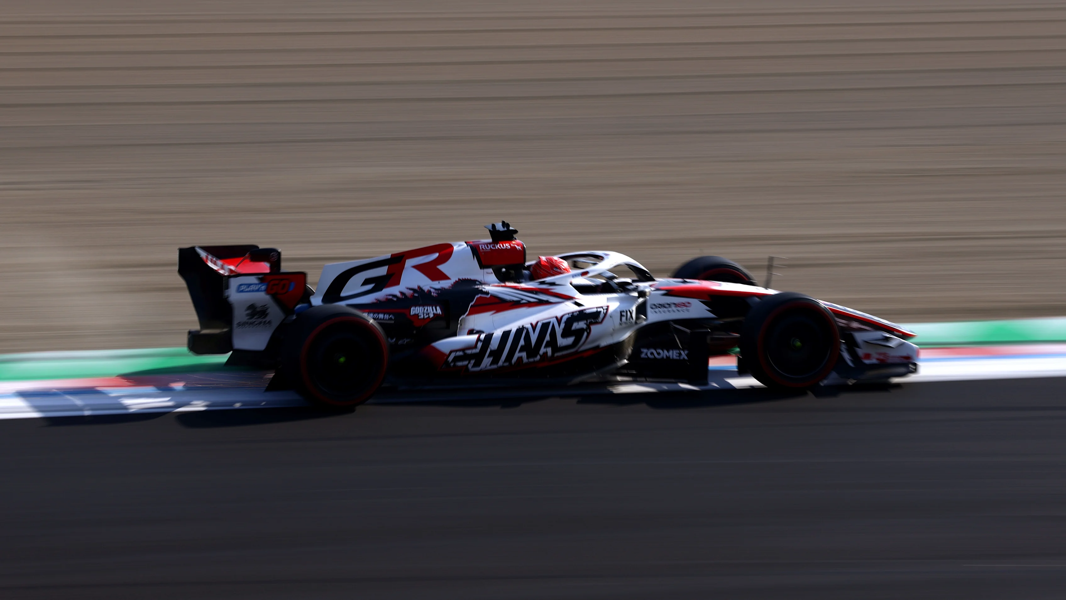 SUZUKA, JAPAN - MARCH 27: Esteban Ocon of France driving the (31) Haas F1 VF-26 Ferrari on track during practice ahead of the F1 Grand Prix of Japan at Suzuka Circuit on March 27, 2026 in Suzuka, Japan. (Photo by Mark Thompson/Getty Images)