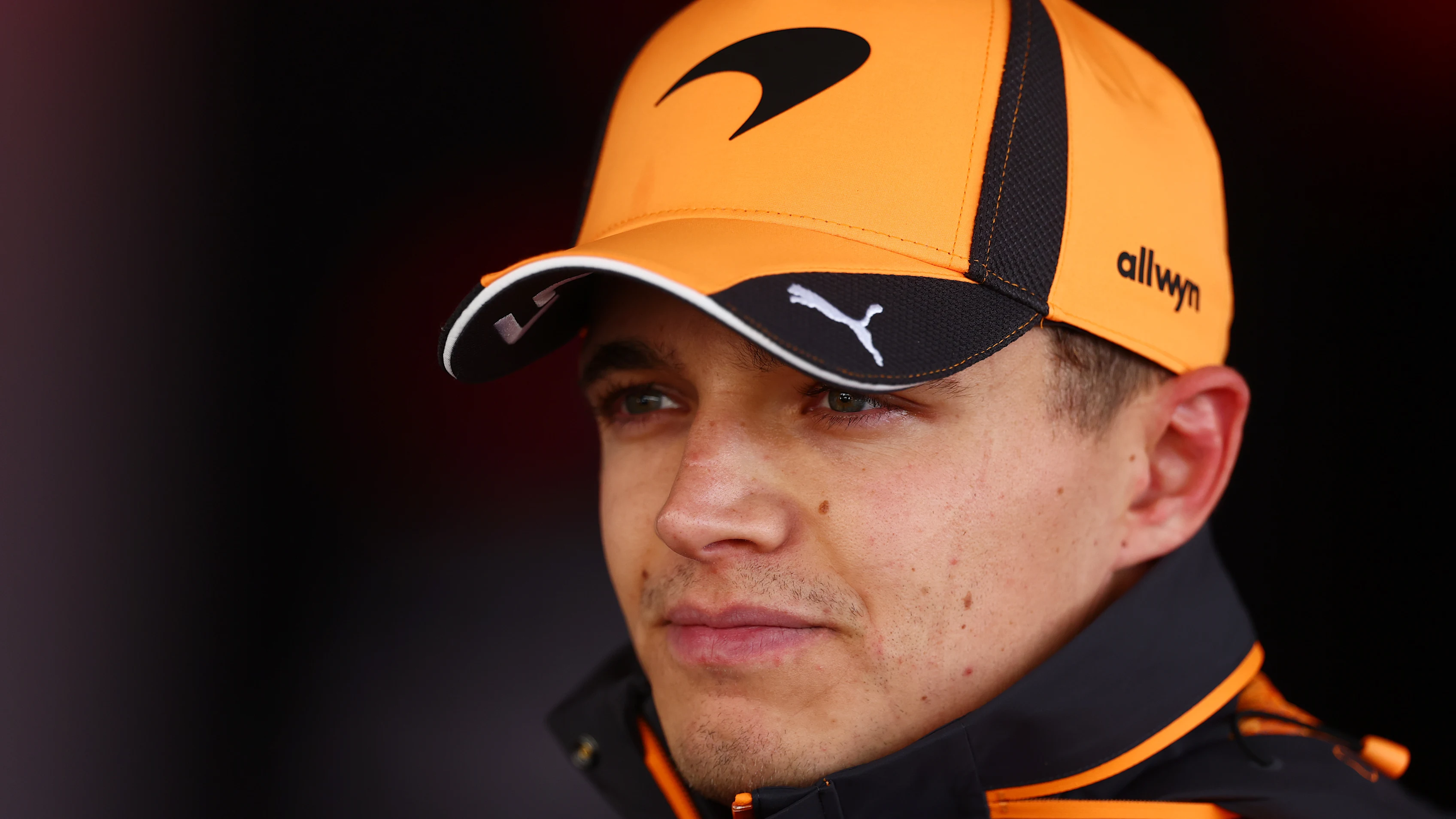 SUZUKA, JAPAN - MARCH 27: Lando Norris of Great Britain and McLaren looks on during practice ahead