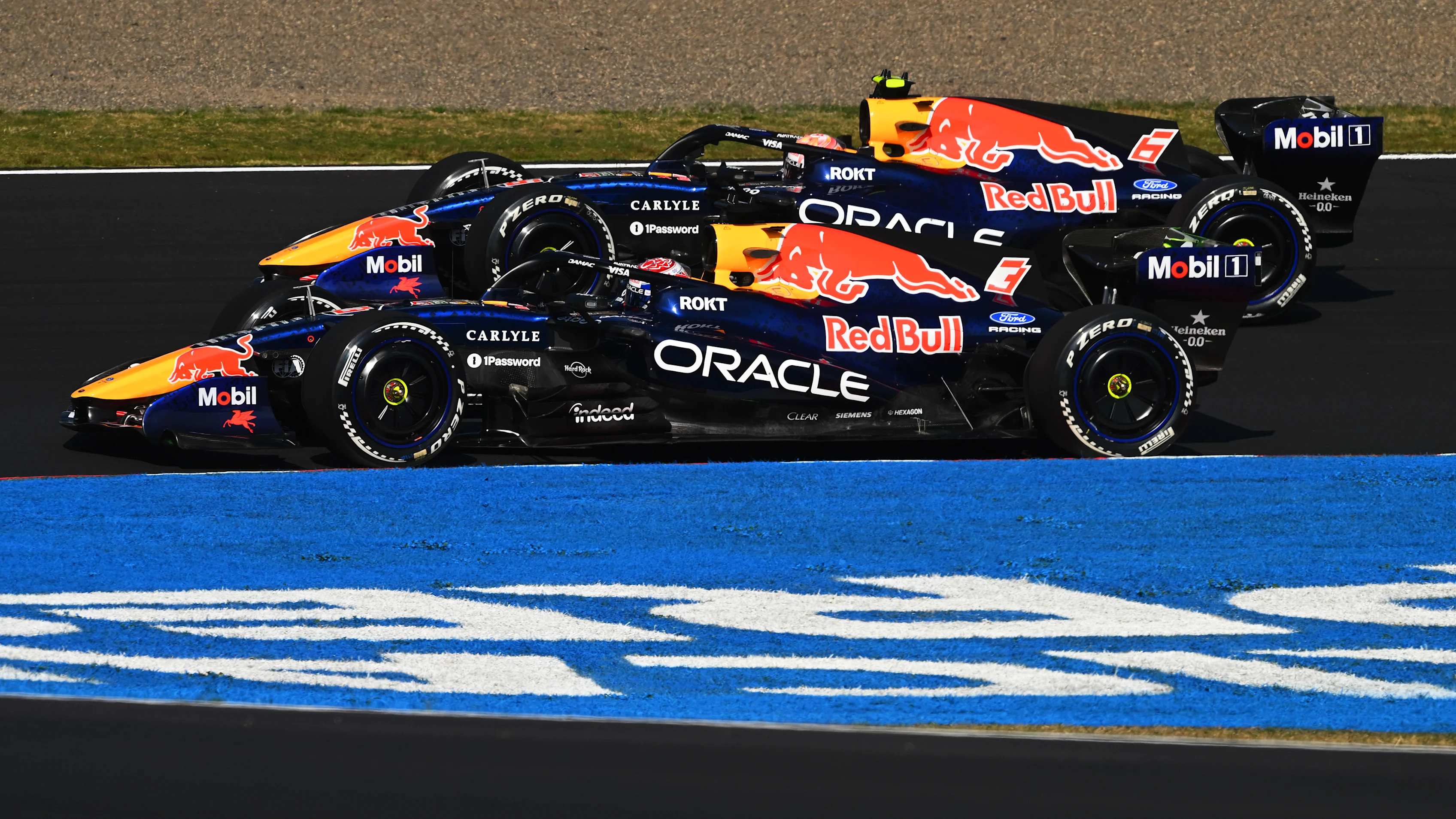 SUZUKA, JAPAN - MARCH 27: Max Verstappen of the Netherlands driving the (3) Oracle Red Bull Racing RB22 Red Bull Ford leads Isack Hadjar of France driving the (6) Oracle Red Bull Racing RB22 Red Bull Ford on track during practice ahead of the F1 Grand Prix of Japan at Suzuka Circuit on March 27, 2026 in Suzuka, Japan. (Photo by Rudy Carezzevoli/Getty Images)