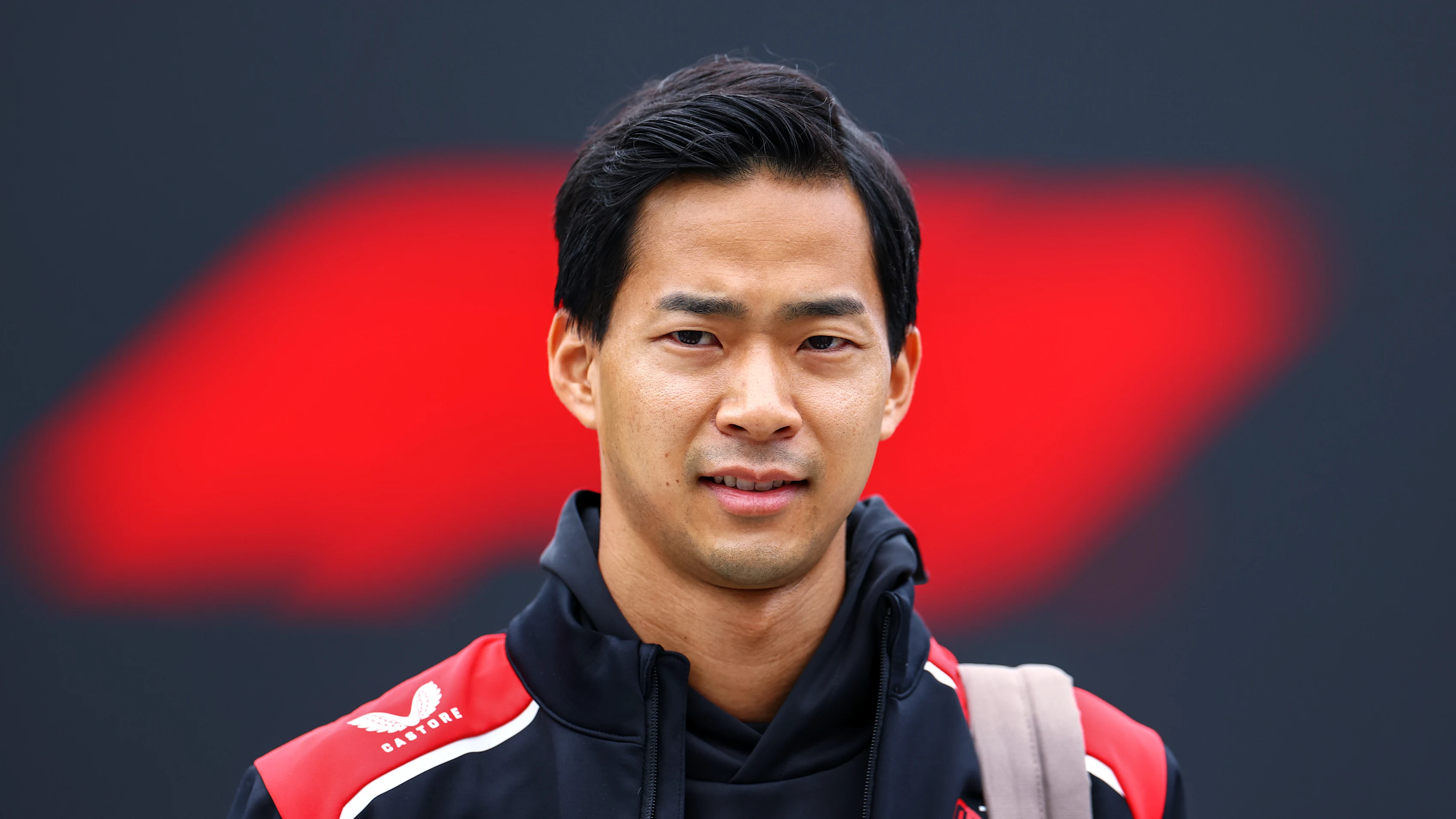 SUZUKA, JAPAN - MARCH 26: Ryo Hirakawa of Japan and Haas F1 arrives in the Paddock during previews