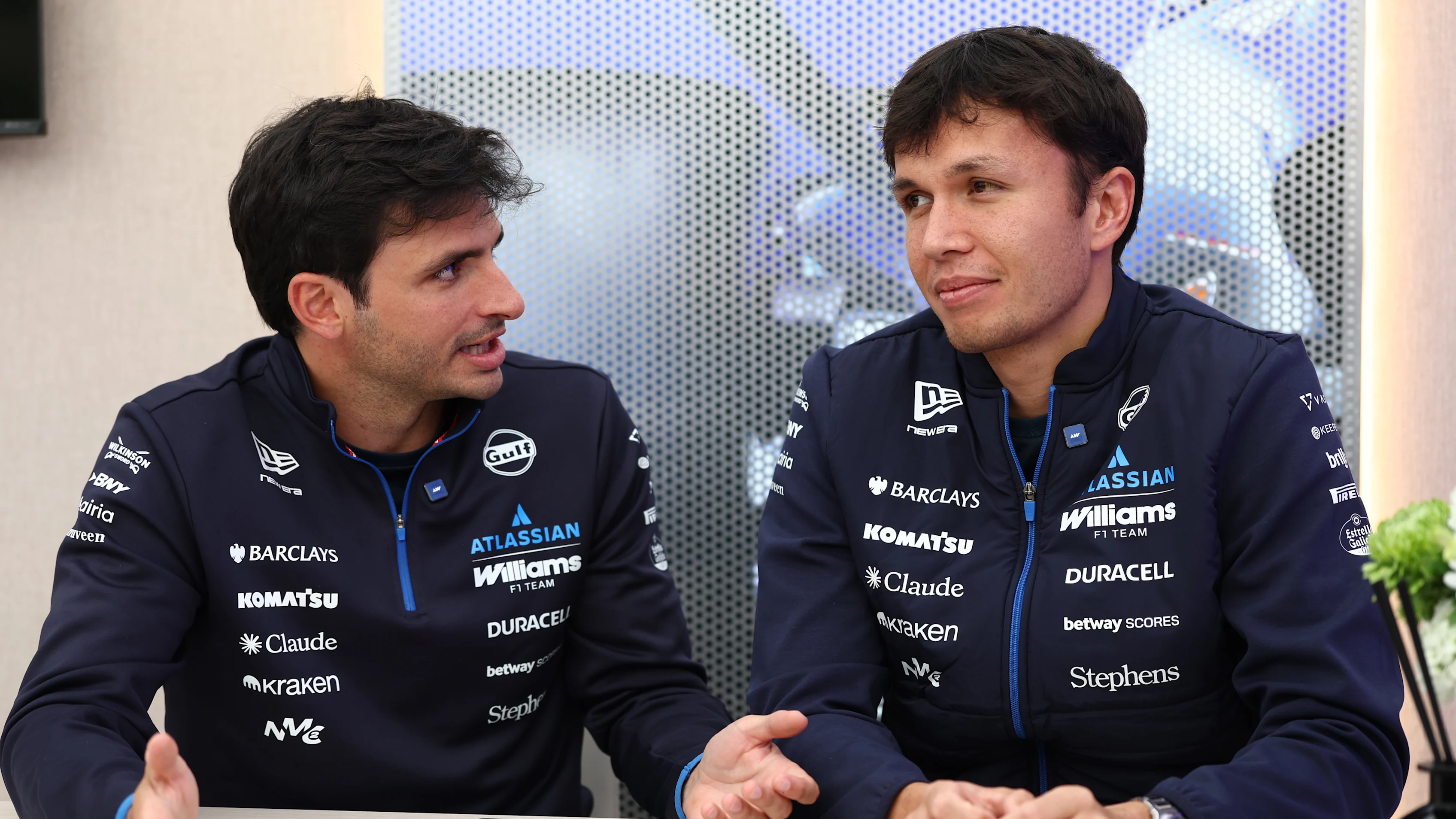 SUZUKA, JAPAN - MARCH 26: Carlos Sainz of Spain and Williams and Alexander Albon of Thailand and