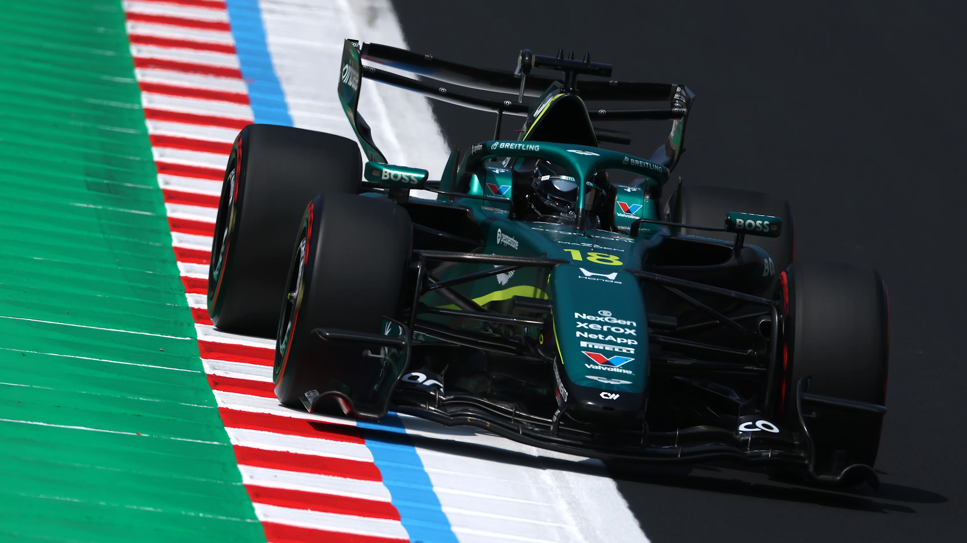 SUZUKA, JAPAN - MARCH 28: Lance Stroll of Canada driving the (18) Aston Martin F1 Team AMR26 Honda