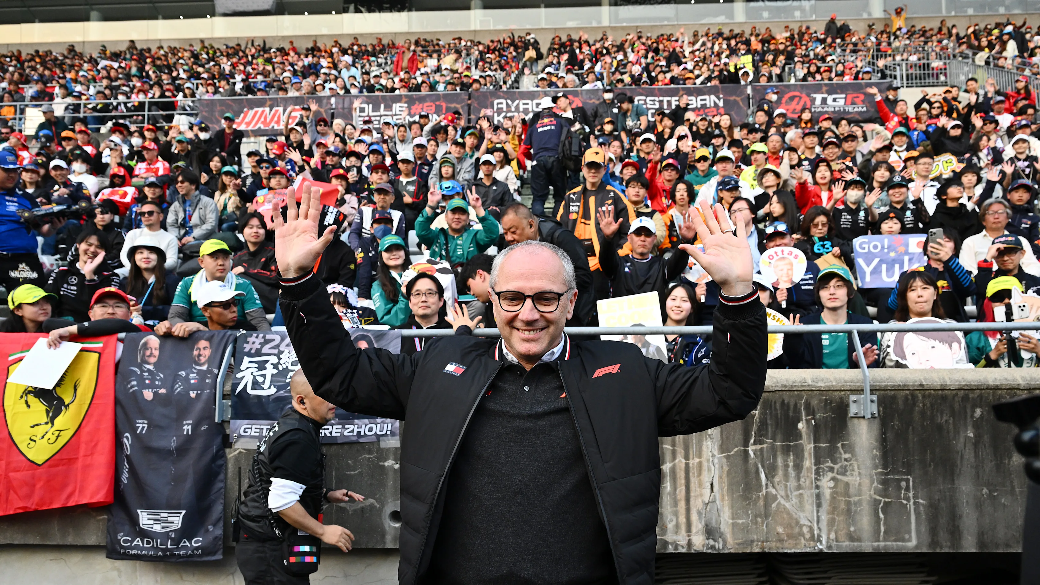 SUZUKA, JAPAN - MARCH 28: Stefano Domenicali, CEO of the Formula One Group with fans during