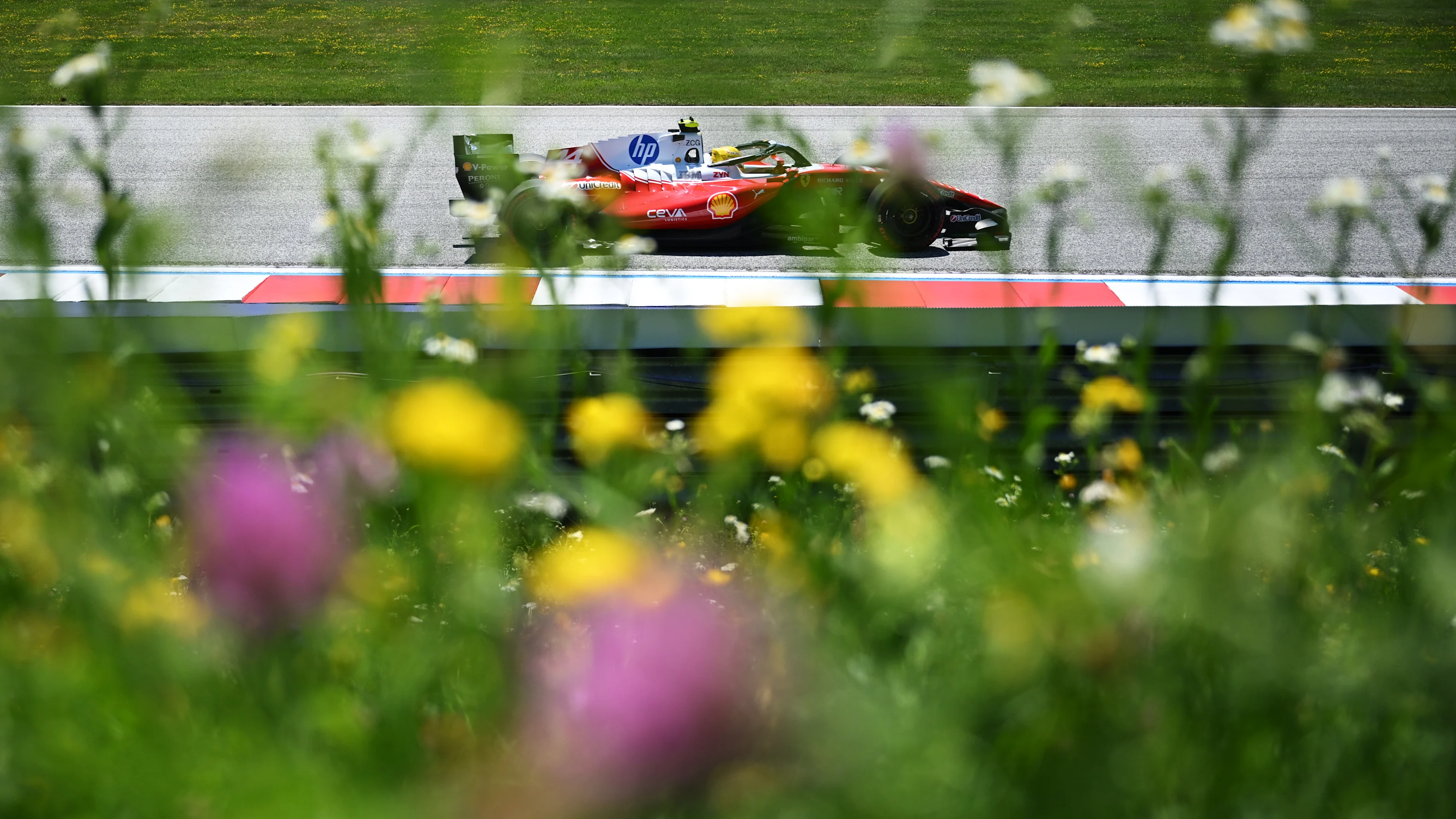 SPIELBERG, AUSTRIA - JUNE 27: Lewis Hamilton of Great Britain driving the (44) Scuderia Ferrari
