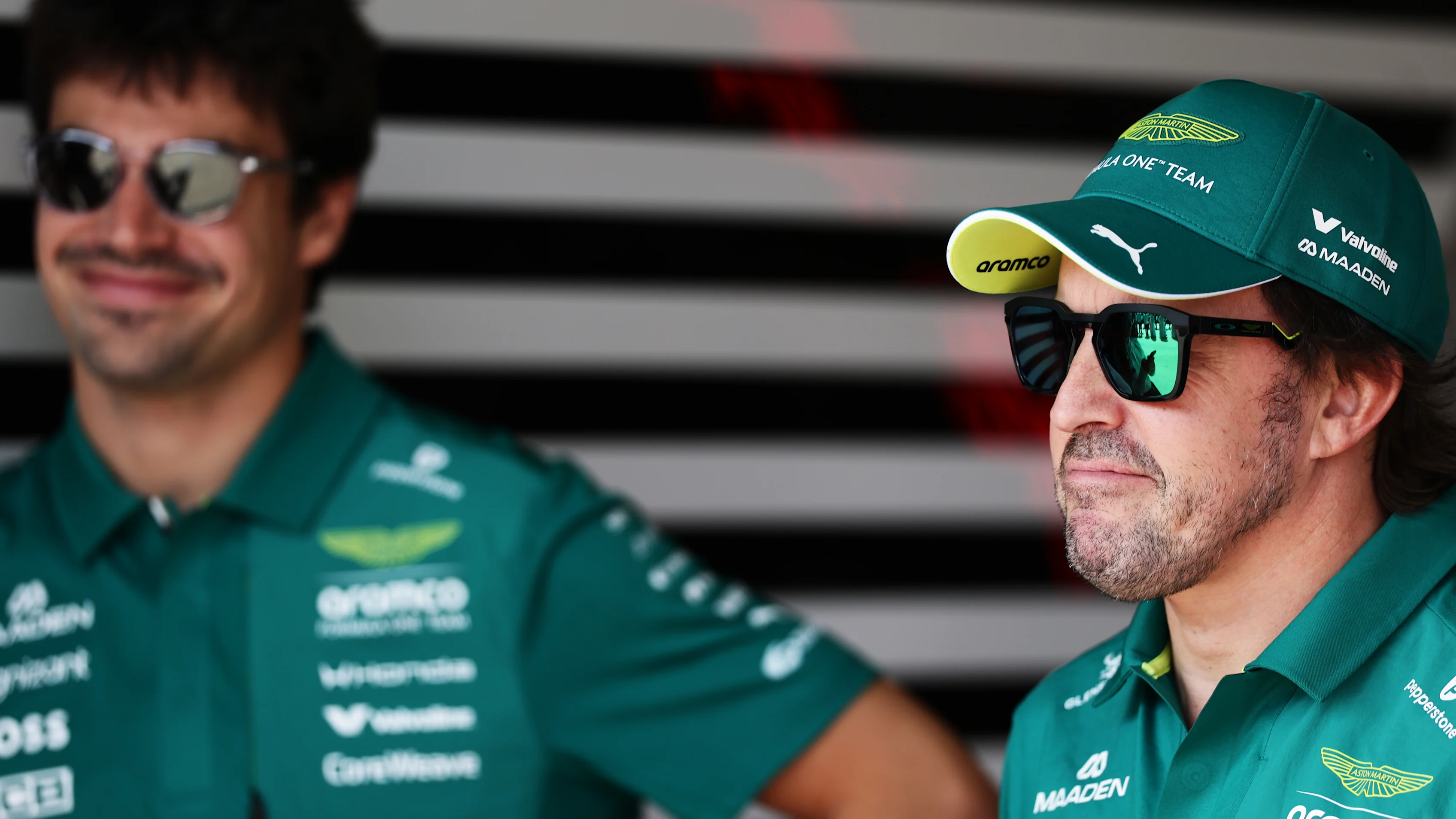 BAKU, AZERBAIJAN - SEPTEMBER 26: Fernando Alonso of Spain and Aston Martin F1 Team and Lance Stroll