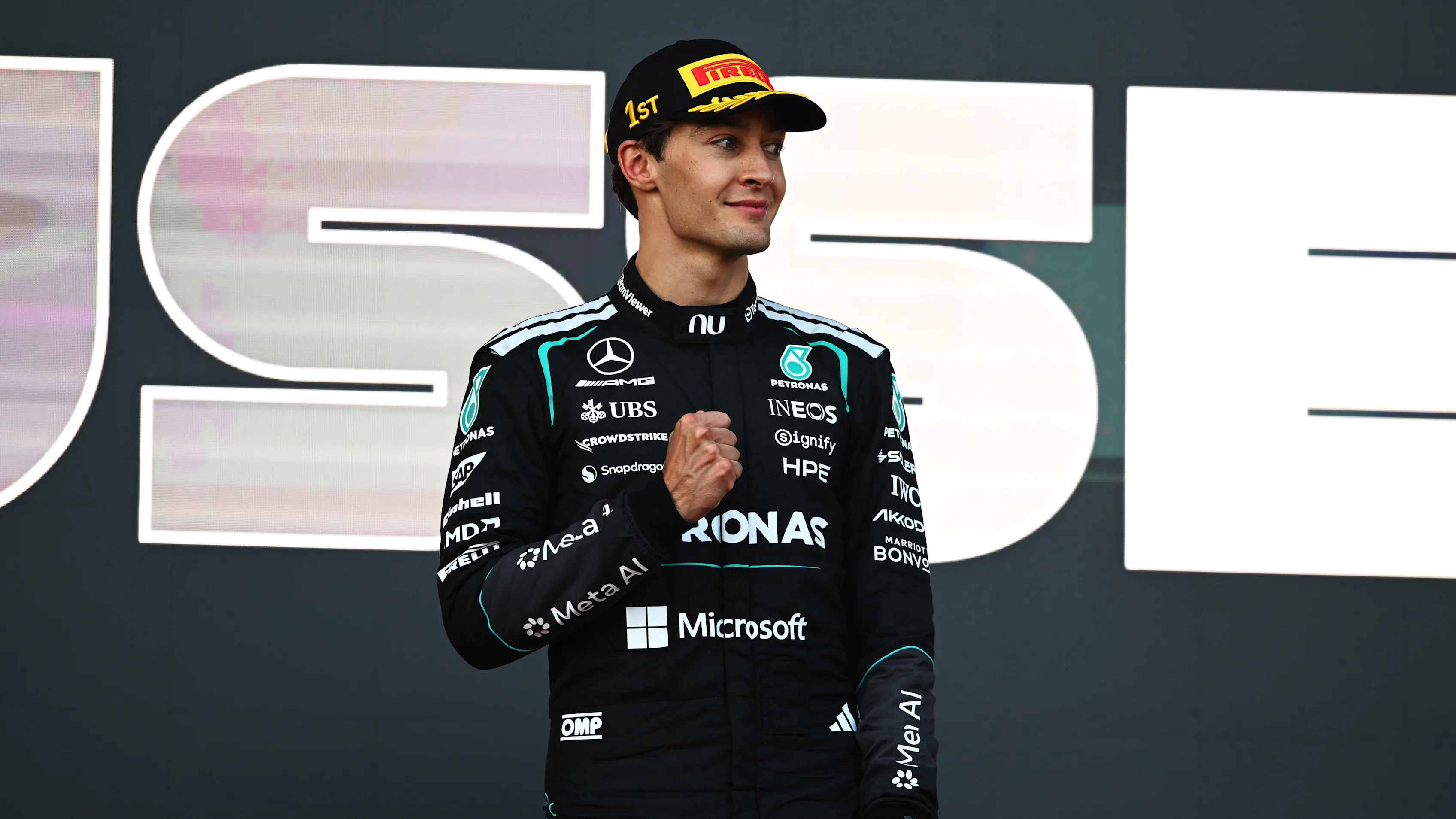 BAKU, AZERBAIJAN - SEPTEMBER 26: Race winner George Russell of Great Britain and Mercedes AMG