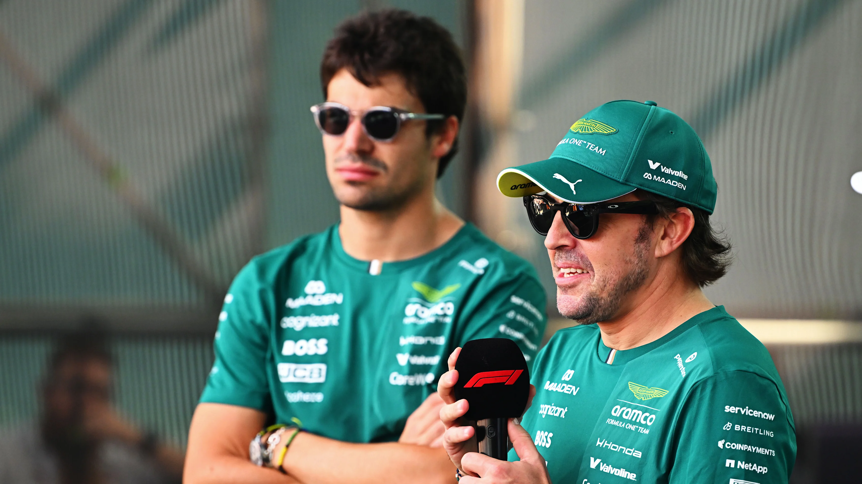 BAKU, AZERBAIJAN - SEPTEMBER 24: Fernando Alonso of Spain and Aston Martin F1 Team and Lance Stroll
