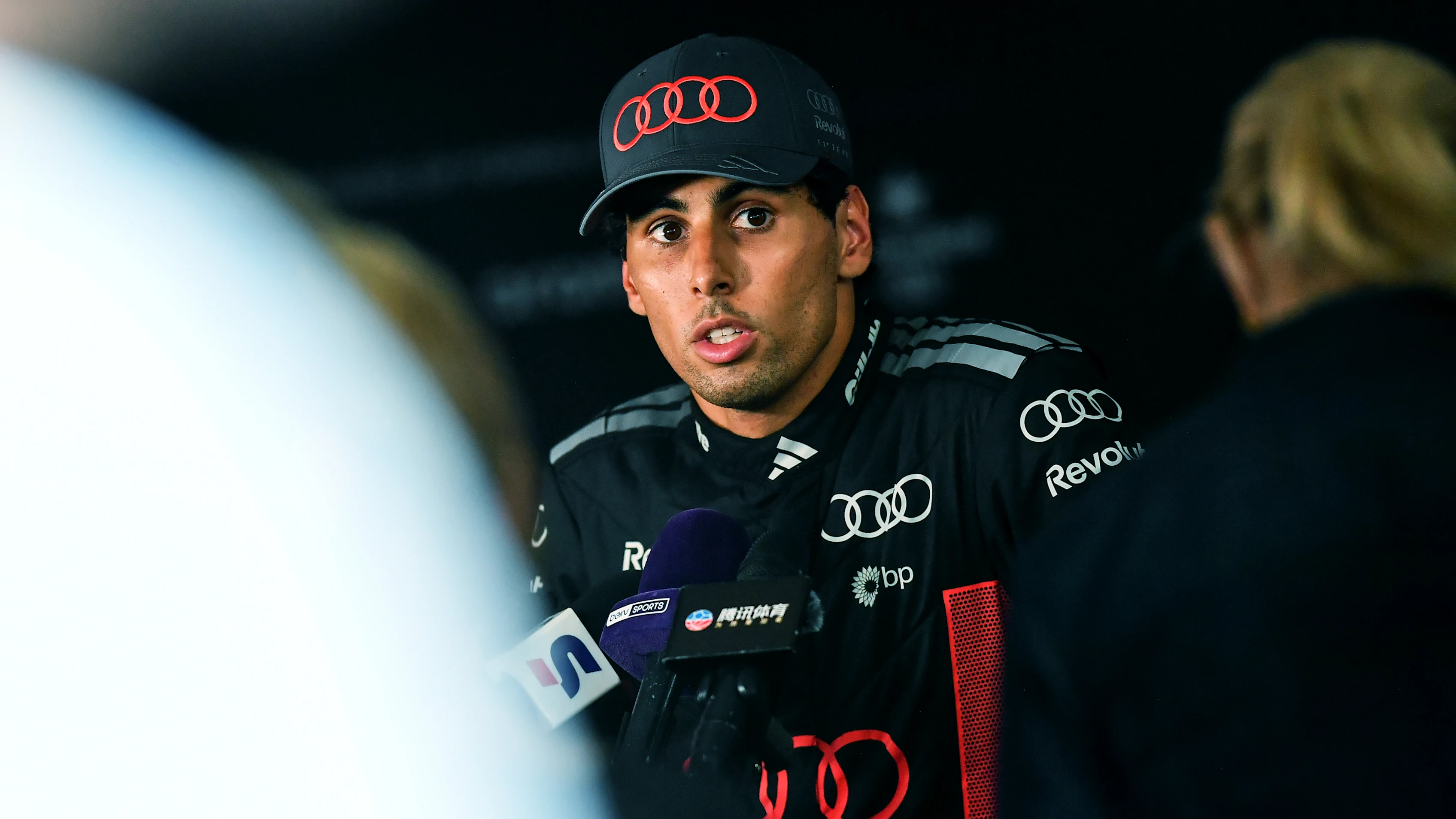 BAKU, AZERBAIJAN - SEPTEMBER 25: Seventeenth placed qualifier Gabriel Bortoleto of Brazil and Audi