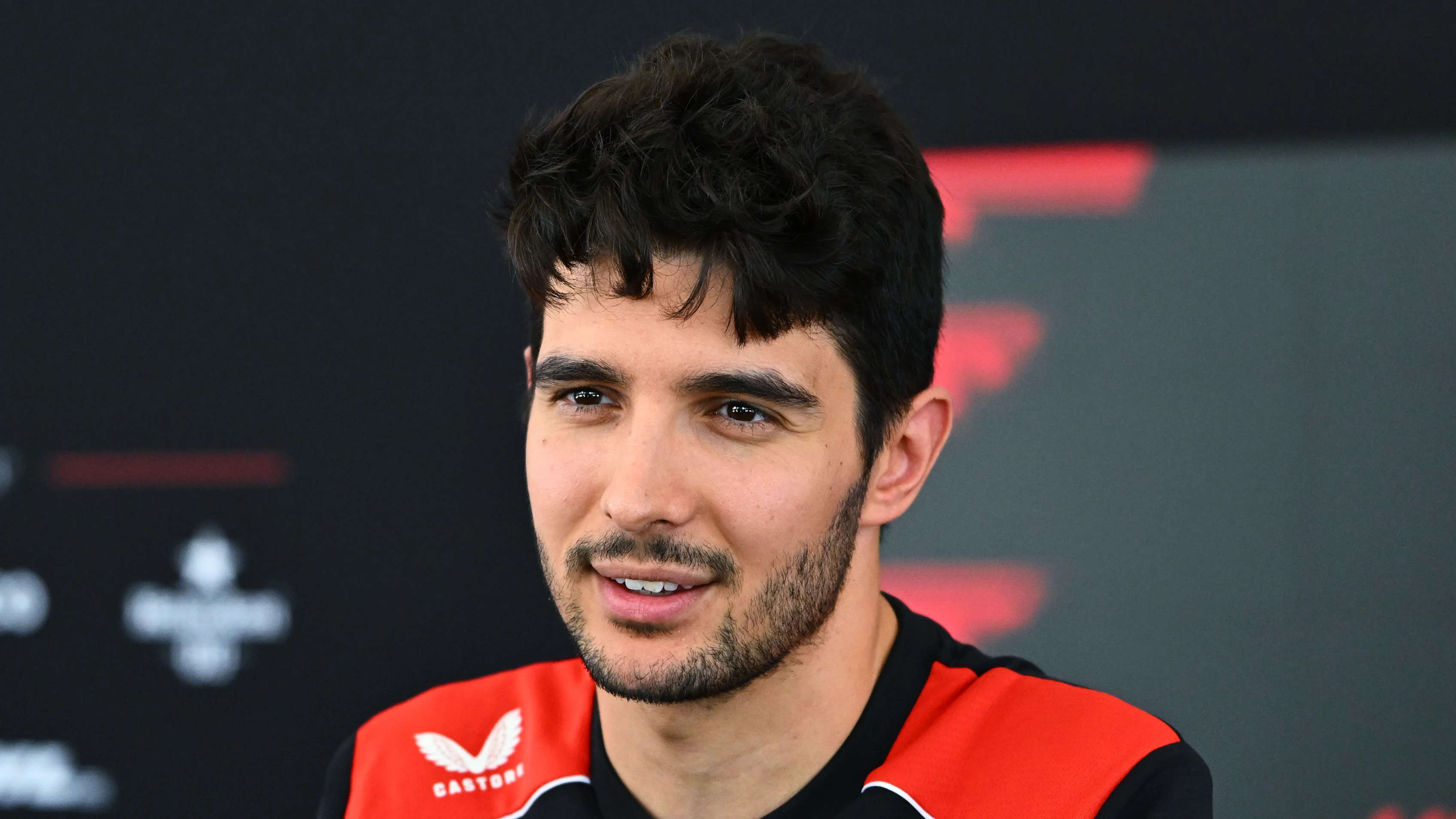 KUALA LUMPUR, MALAYSIA - OCTOBER 01: Esteban Ocon of France and Haas F1 talks to the media during