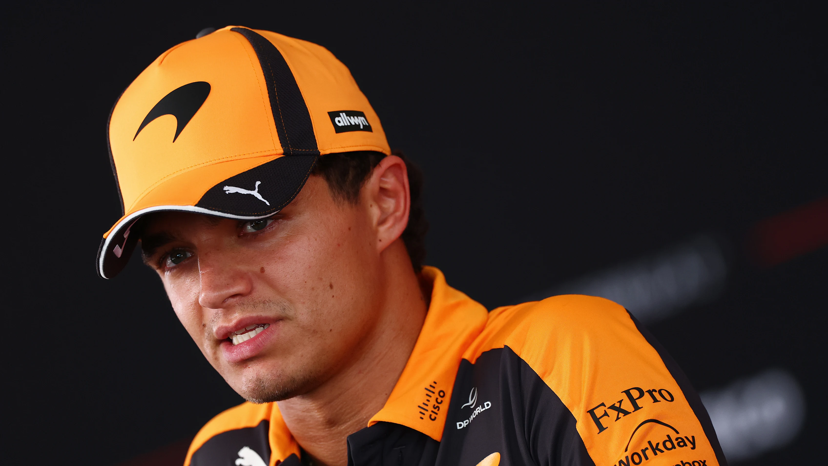 KUALA LUMPUR, MALAYSIA - OCTOBER 01: Lando Norris of Great Britain and McLaren talks to the media