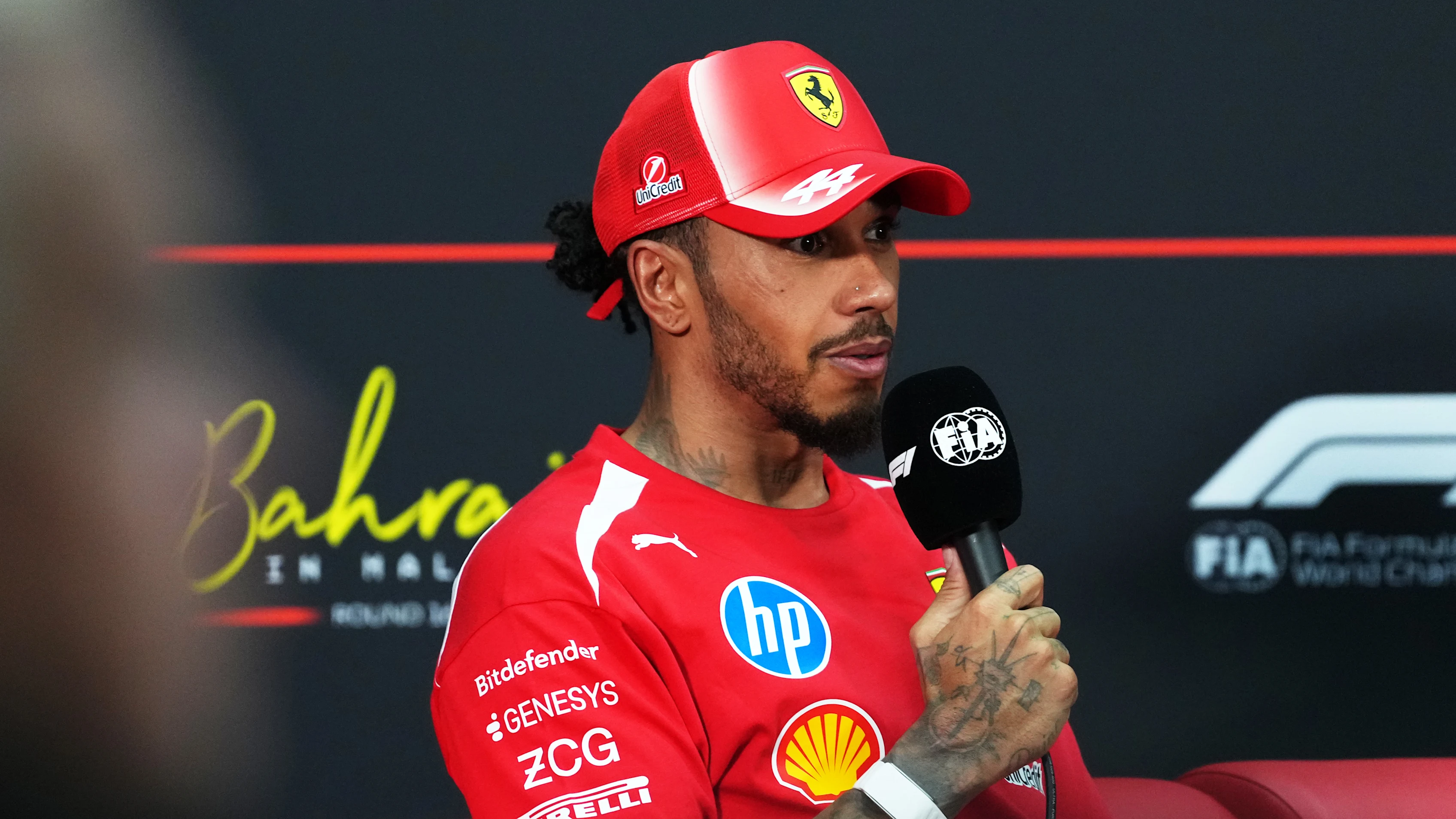 KUALA LUMPUR, MALAYSIA - OCTOBER 03: Second placed qualifier Lewis Hamilton of Great Britain and