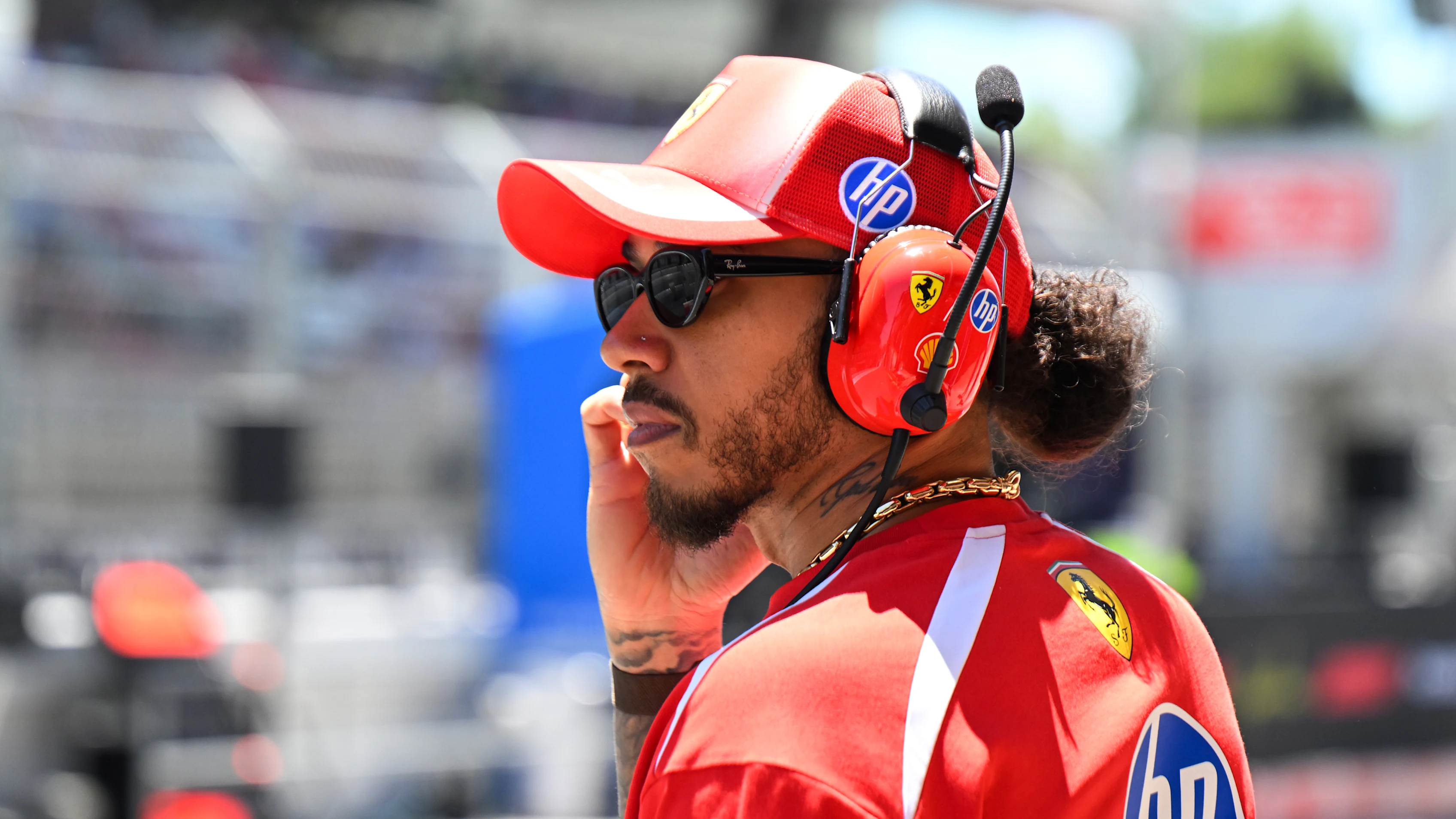 BARCELONA, SPAIN - JUNE 12: Lewis Hamilton of Great Britain and Scuderia Ferrari looks on in the