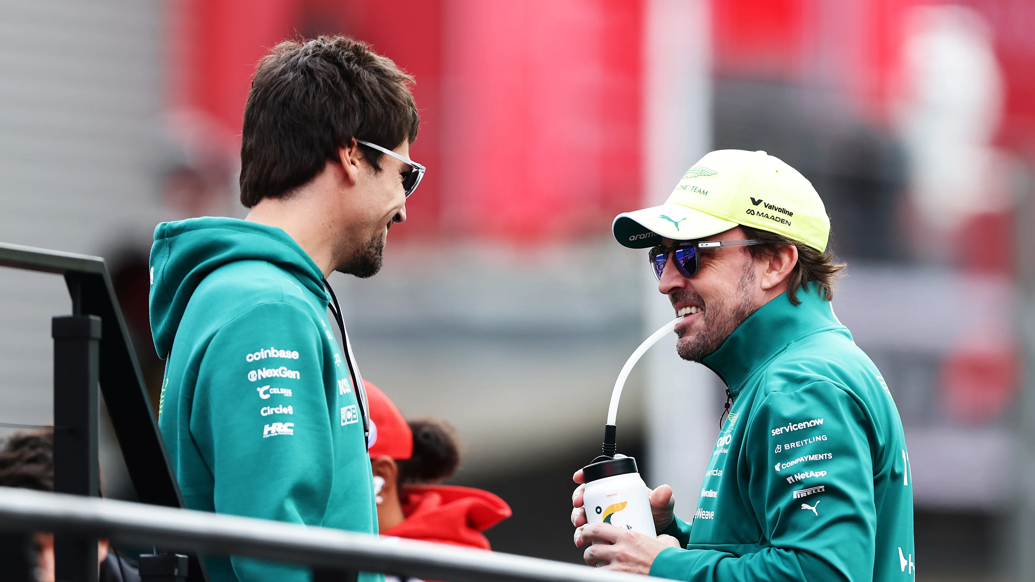 SPA, BELGIUM - JULY 19: Lance Stroll of Canada and Aston Martin F1 Team and Fernando Alonso of