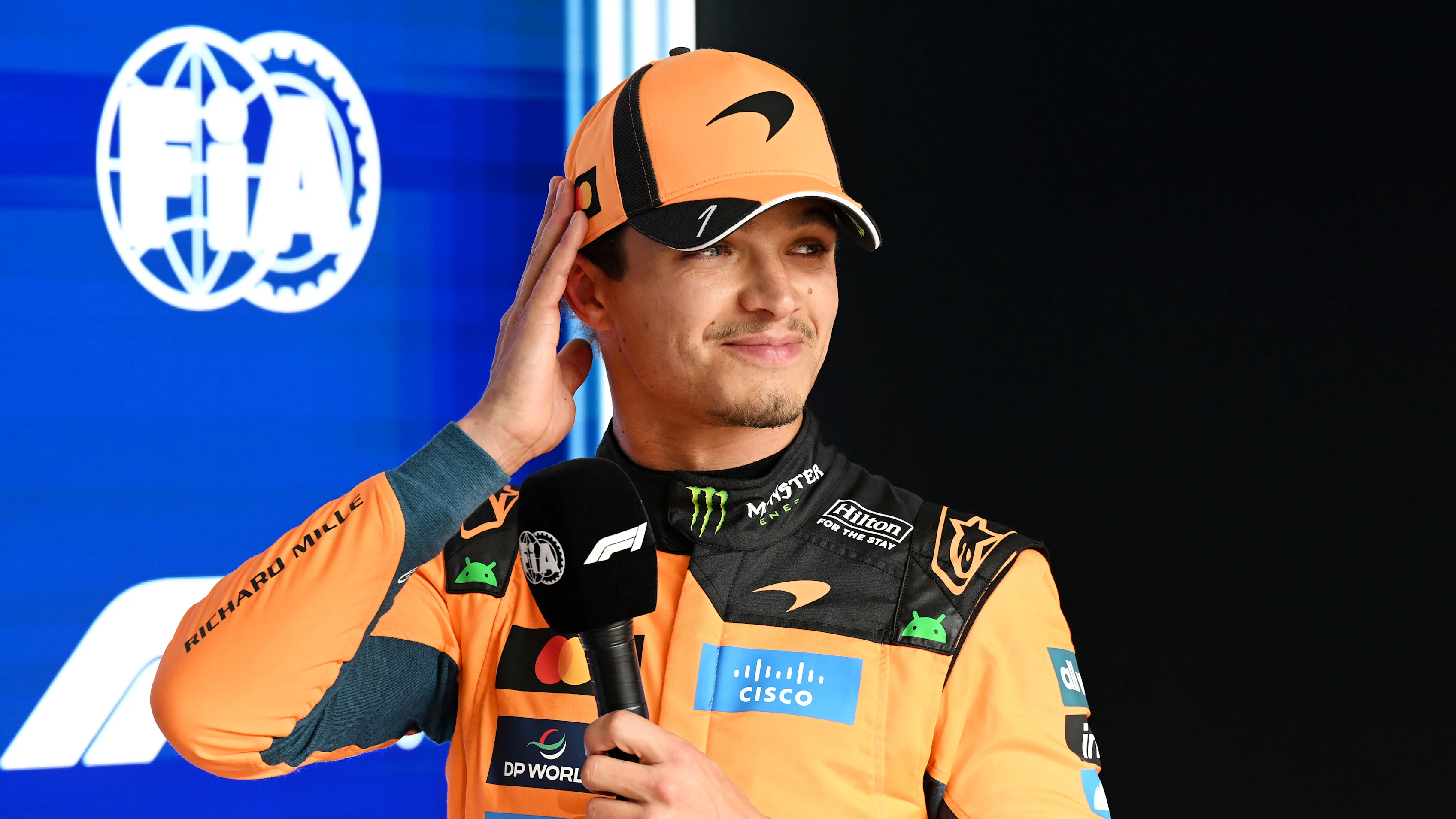 SPA, BELGIUM - JULY 18: Third placed qualifier Lando Norris of Great Britain and McLaren looks on