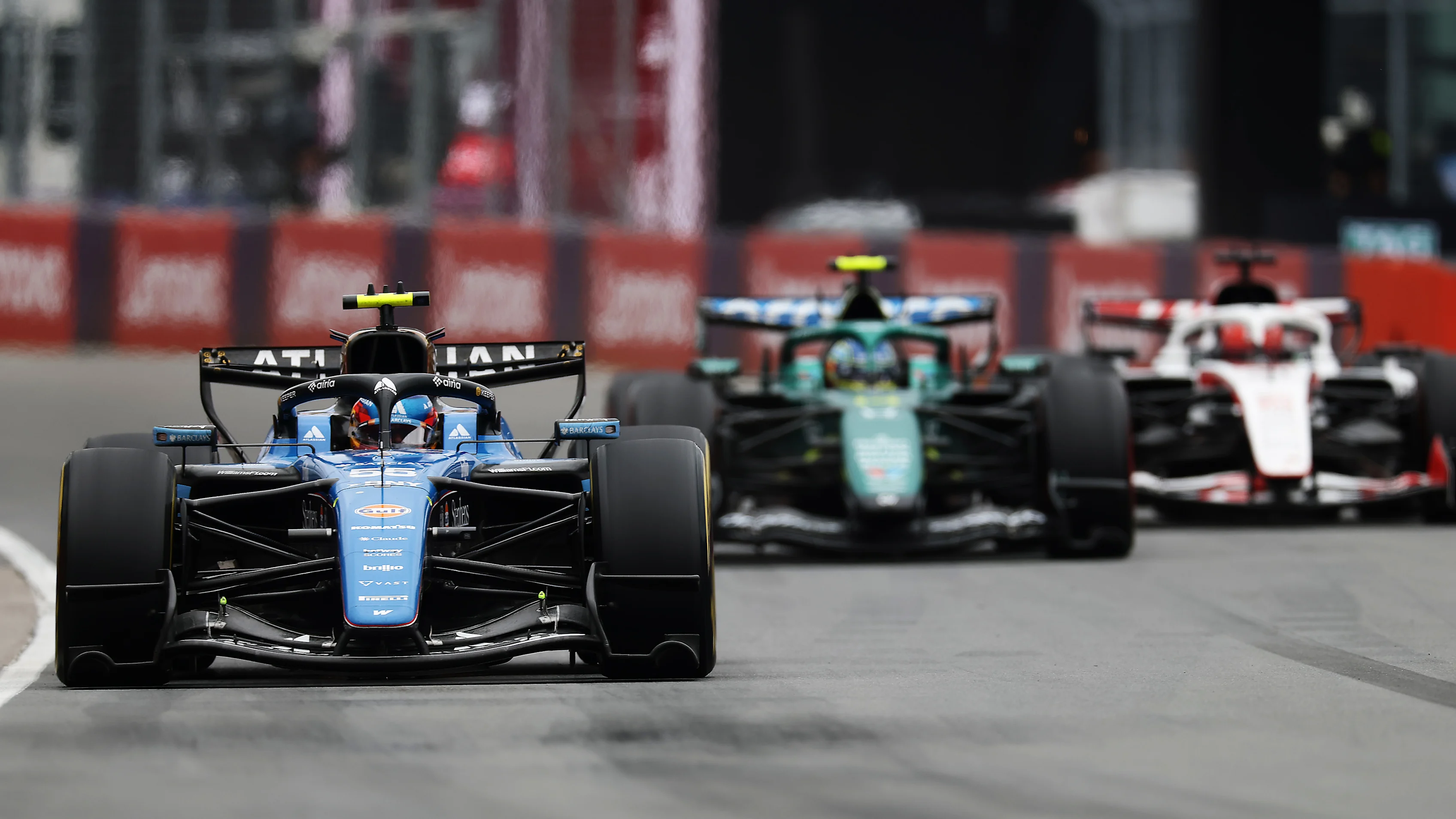 MONTREAL, QUEBEC - MAY 24: Carlos Sainz of Spain driving the (55) Williams FW48 Mercedes leads Fernando Alonso of Spain driving the (14) Aston Martin F1 Team AMR26 Honda on track during the F1 Grand Prix of Canada at Circuit Gilles-Villeneuve on May 24, 2026 in Montreal, Quebec. (Photo by Mark Thompson/Getty Images)